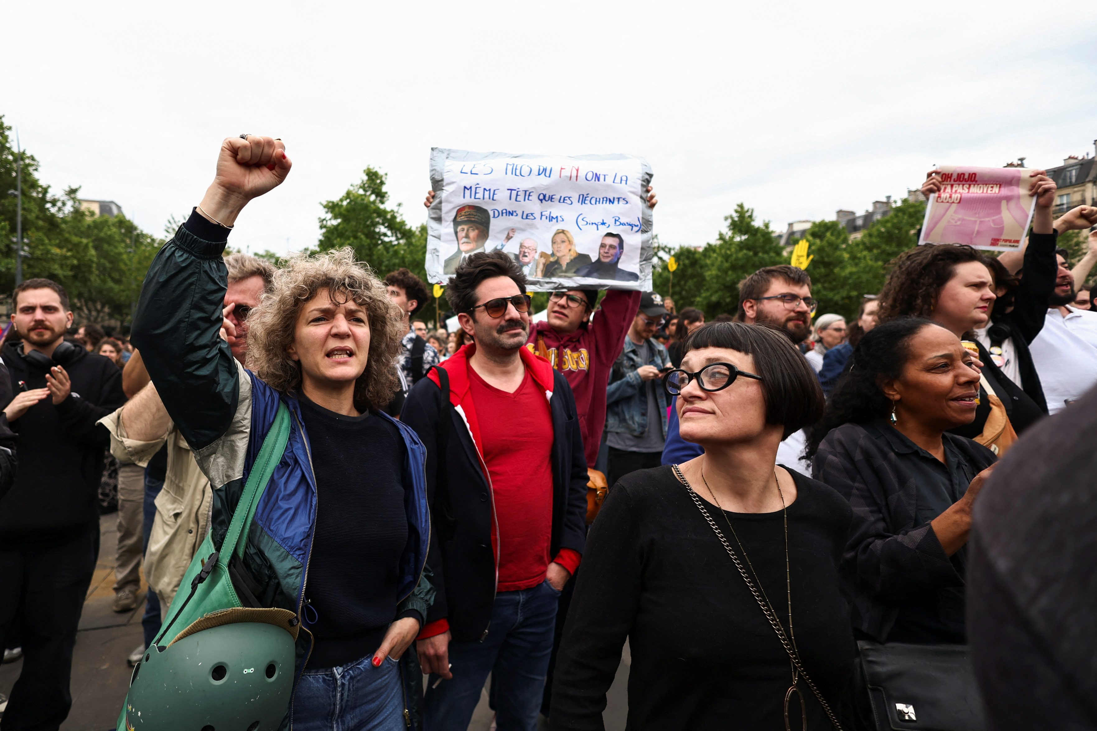 People gather to protest against the French far-right Rassemblement National (National Rally - RN) party, at Place de la Republique, following results in the first round of the early 2024 legislative elections, in Paris, France, July 3, 2024. REUTERS/Yara Nardi