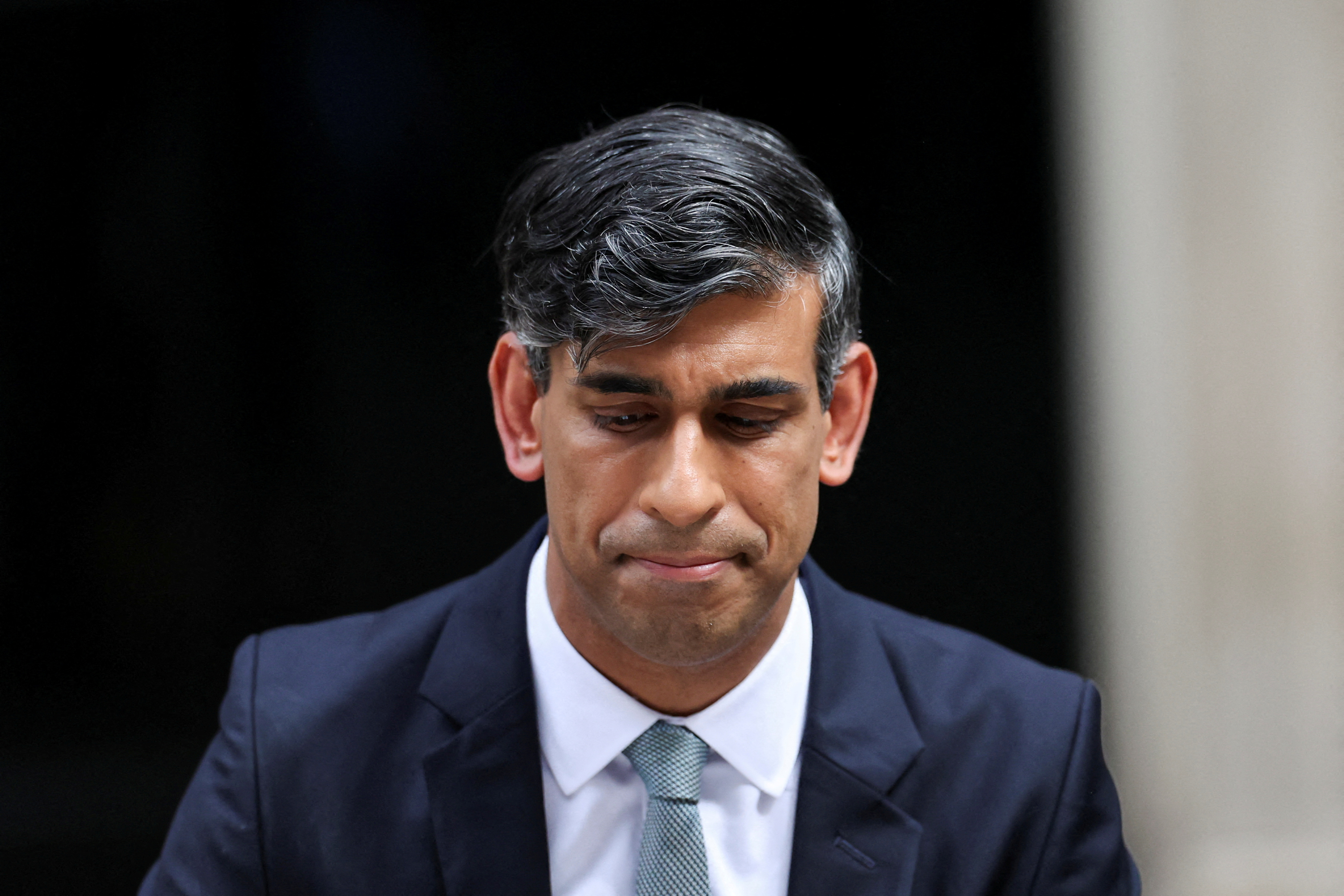 Outgoing British Prime Minister Rishi Sunak looks on as he speaks at Number 10 Downing Street, following the results of the elections, in London, Britain, July 5, 2024. REUTERS/Claudia Greco TPX IMAGES OF THE DAY