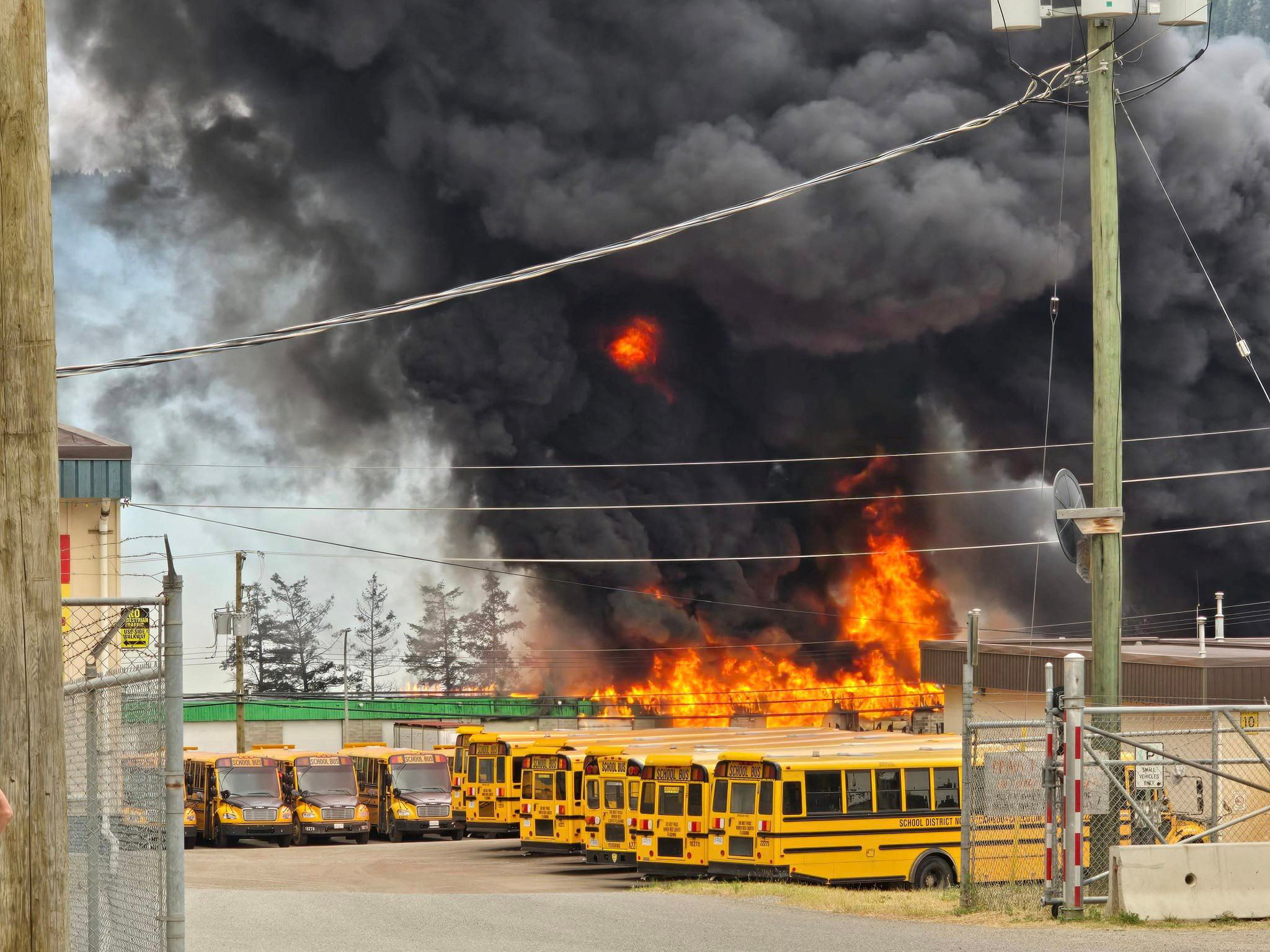 Smoke and flames rise from a wildfire in British Columbia, Canada