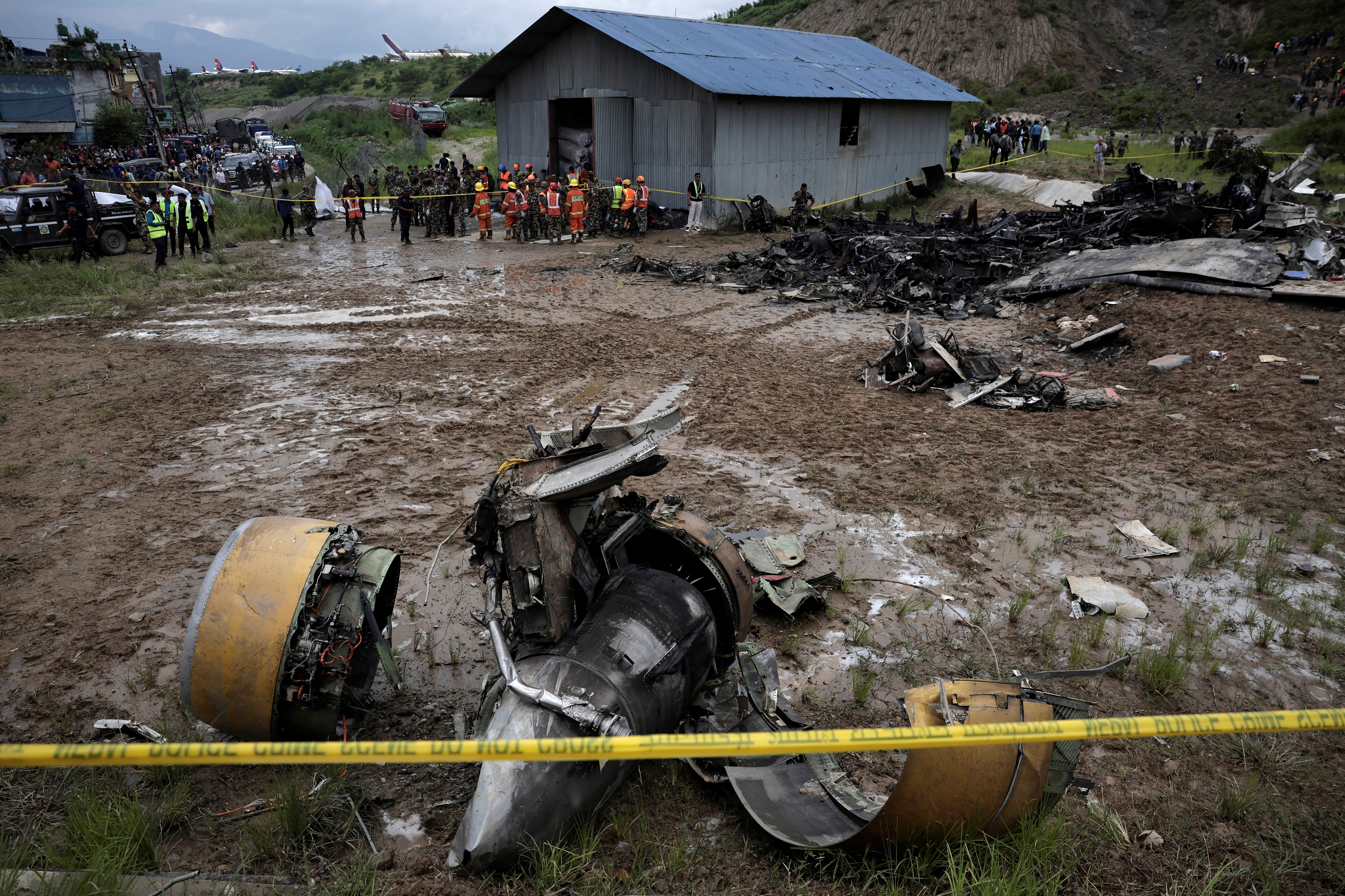 Plane crash at Nepal's Kathmandu airport kills 18 people