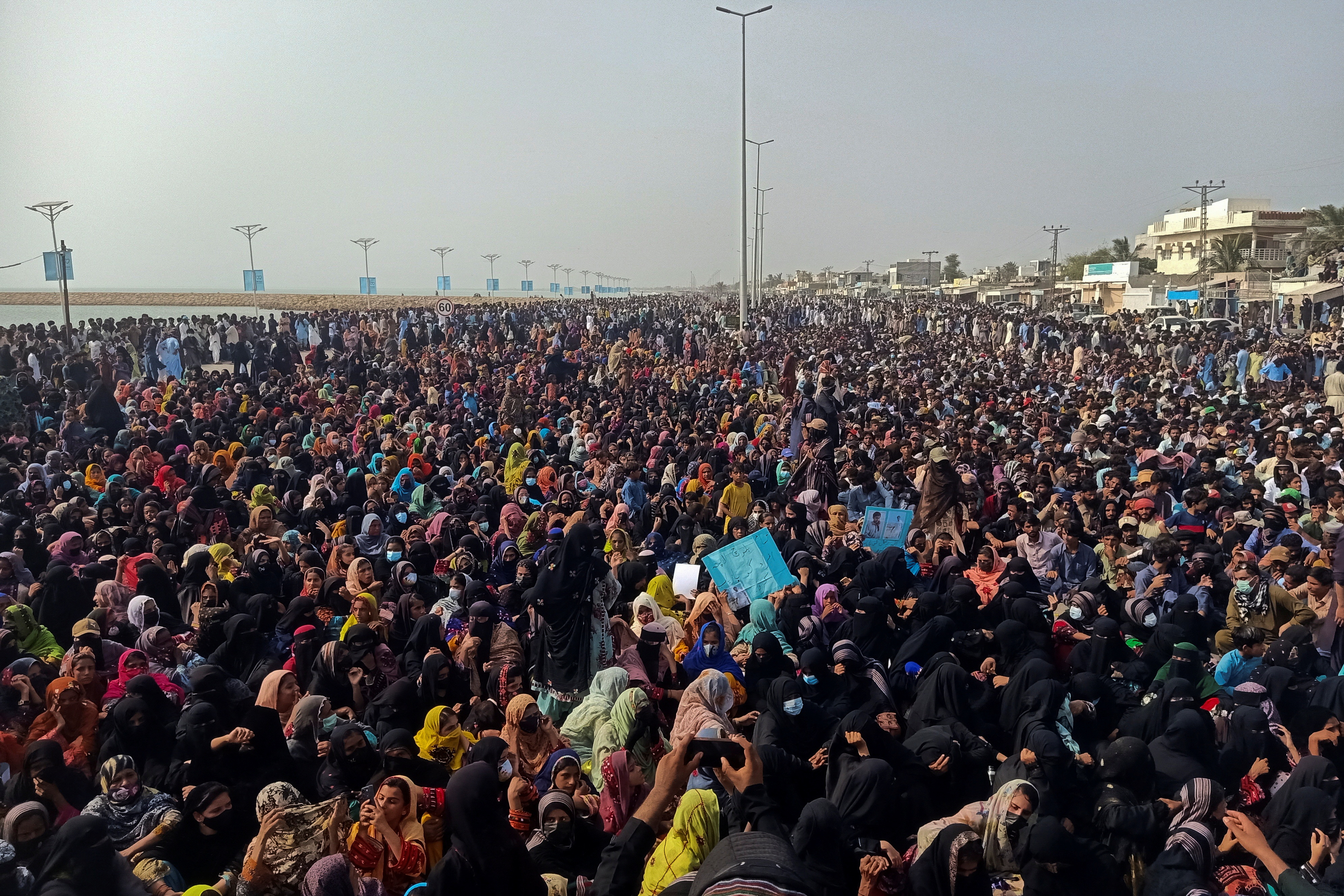 People from the Baloch community take part in a demonstration demanding greater rights in Gwadar of Pakistan's Balochistan province