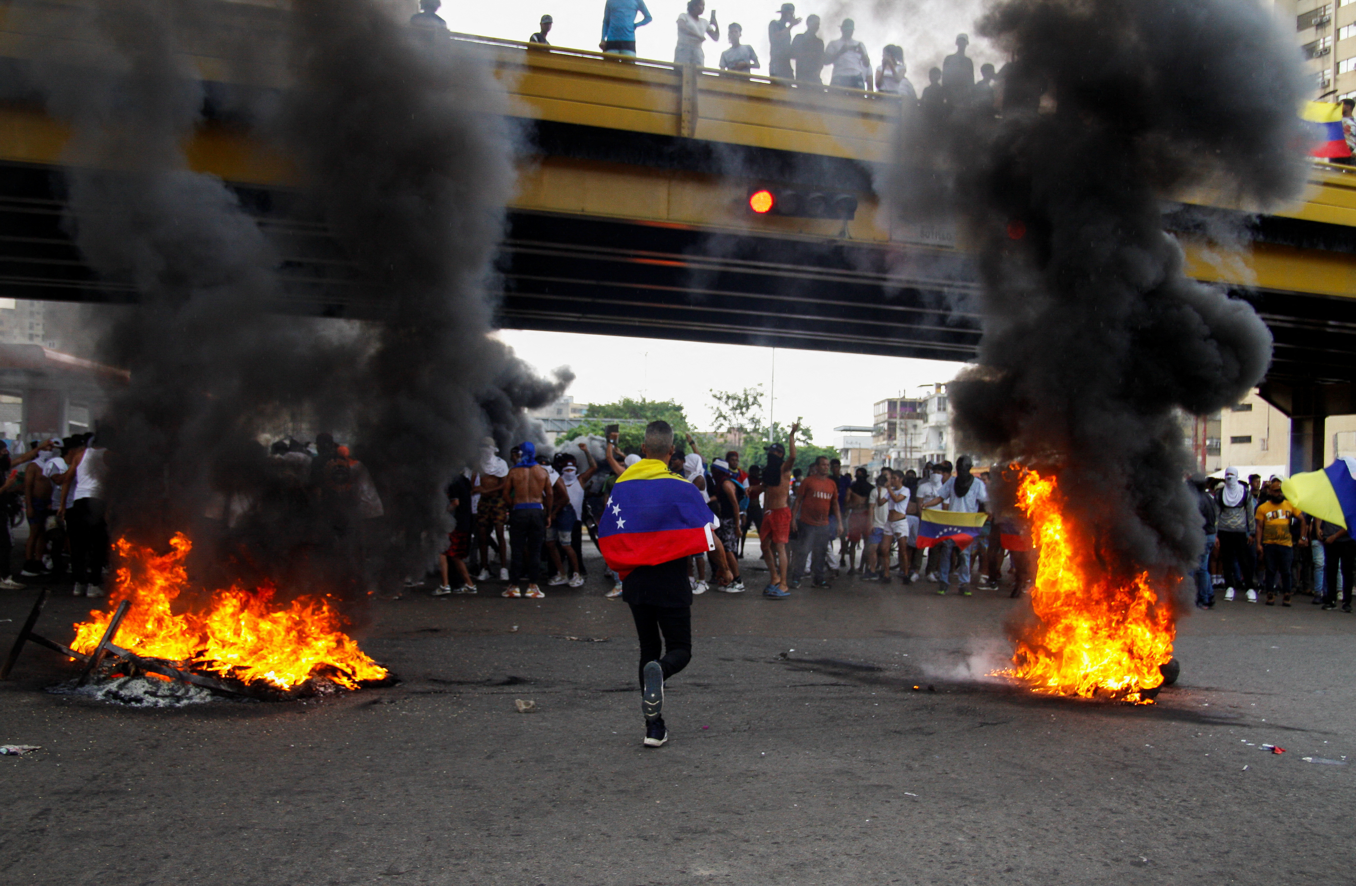 Venezuelan protesters teargassed in wake of disputed vote