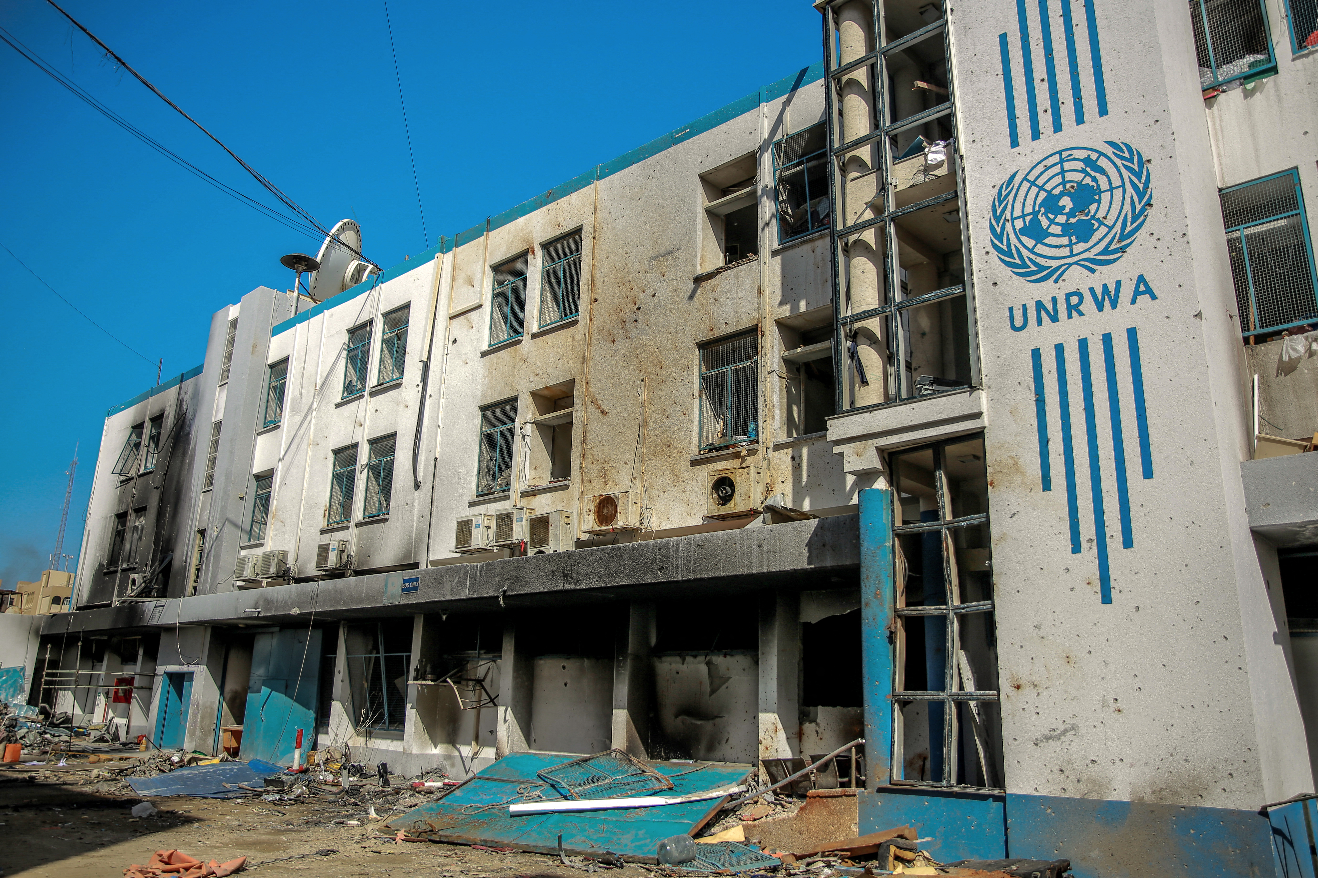 This picture shows the damaged Gaza City headquarters of the United Nations Relief and Works Agency for Palestine Refugees (UNRWA) on February 15, 2024, amid ongoing battles between Israel and the militant group Hamas. - Several countries -- including the United States, Britain, Germany and Japan -- have suspended funding to the UNRWA agency in response to Israeli allegations that some of its staff members participated in the October 7 attack by Hamas militants. (Photo by AFP)
