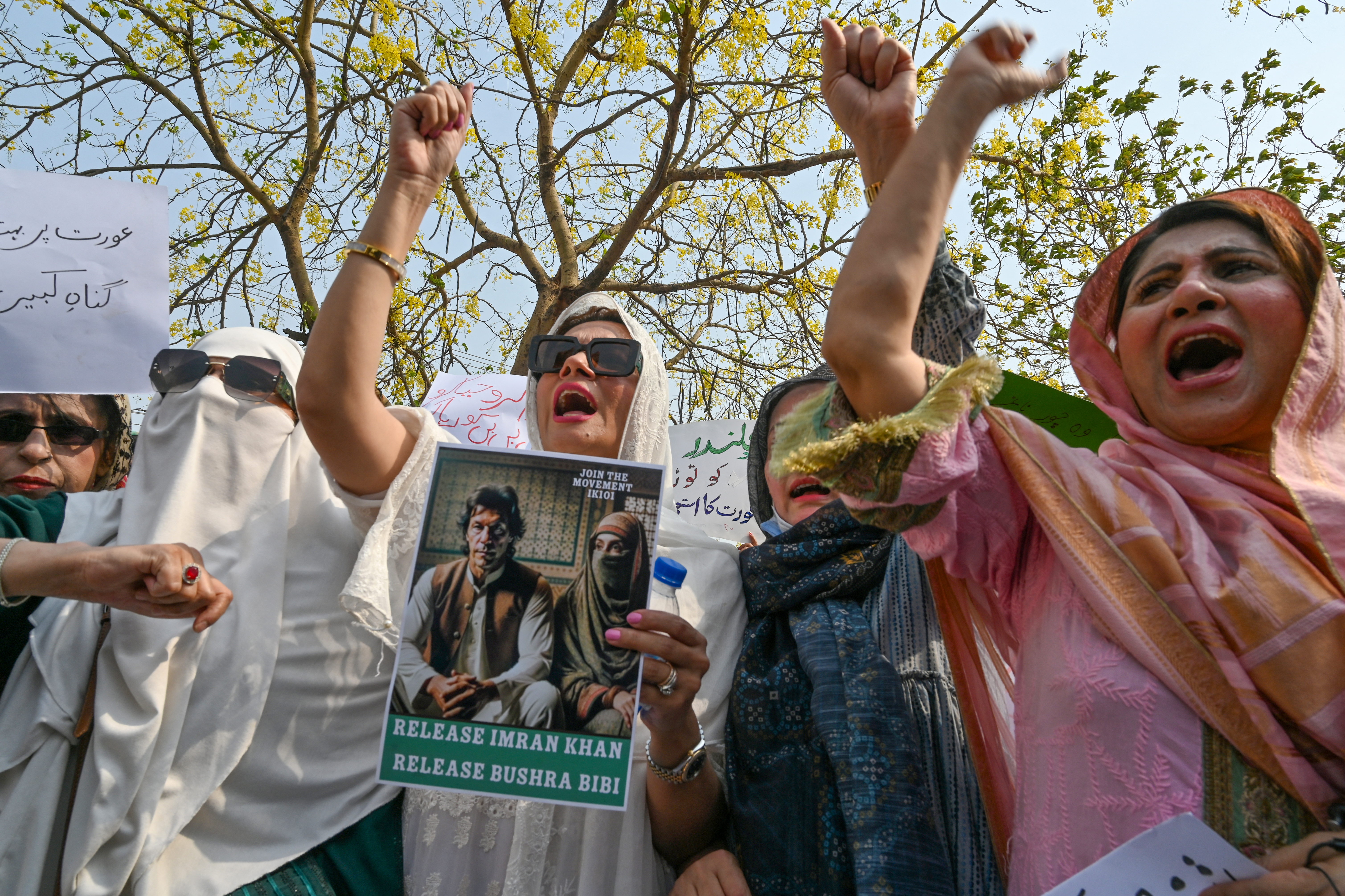 Pakistan's former prime minister Imran Khan's supporters protest outside the court in Islamabad on June 27, 2024, to demand the release of Khan and his wife Bushra Bibi. An Islamabad court rejected on June 27 a plea to suspend the jail terms of former Pakistani prime minister Imran Khan and his wife, whose marriage was ruled illegal under Islamic law. (Photo by Farooq NAEEM / AFP)