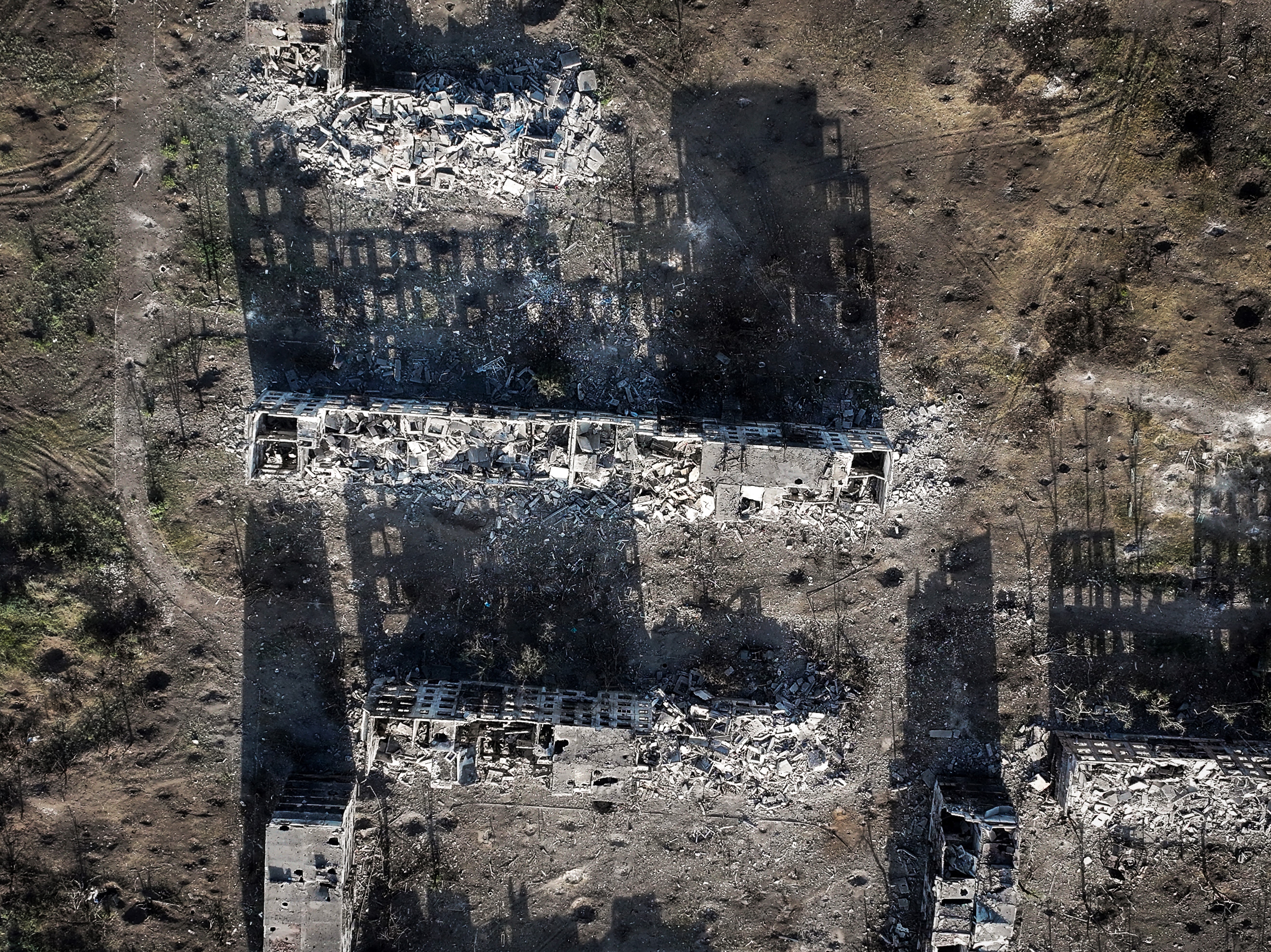 This handout photograph taken and released by the press service of the 24th Mechanized Brigade of Ukrainian Armed Forces on July 4, 2024, shows an aerial view of the destroyed Novyy district in the town of Chasiv Yar, Donetsk region, amid the Russian invasion of Ukraine. (Photo by Handout / press service of the 24th mechanized brigade of Ukrainian Armed forces / AFP) / RESTRICTED TO EDITORIAL USE - MANDATORY CREDIT "AFP PHOTO / PRESS SERVICE OF THE 24TH MECHANIZED BRIGADE OF UKRAINIAN ARMED FORCES " - NO MARKETING NO ADVERTISING CAMPAIGNS - DISTRIBUTED AS A SERVICE TO CLIENTS RESTRICTED TO EDITORIAL USE - MANDATO
