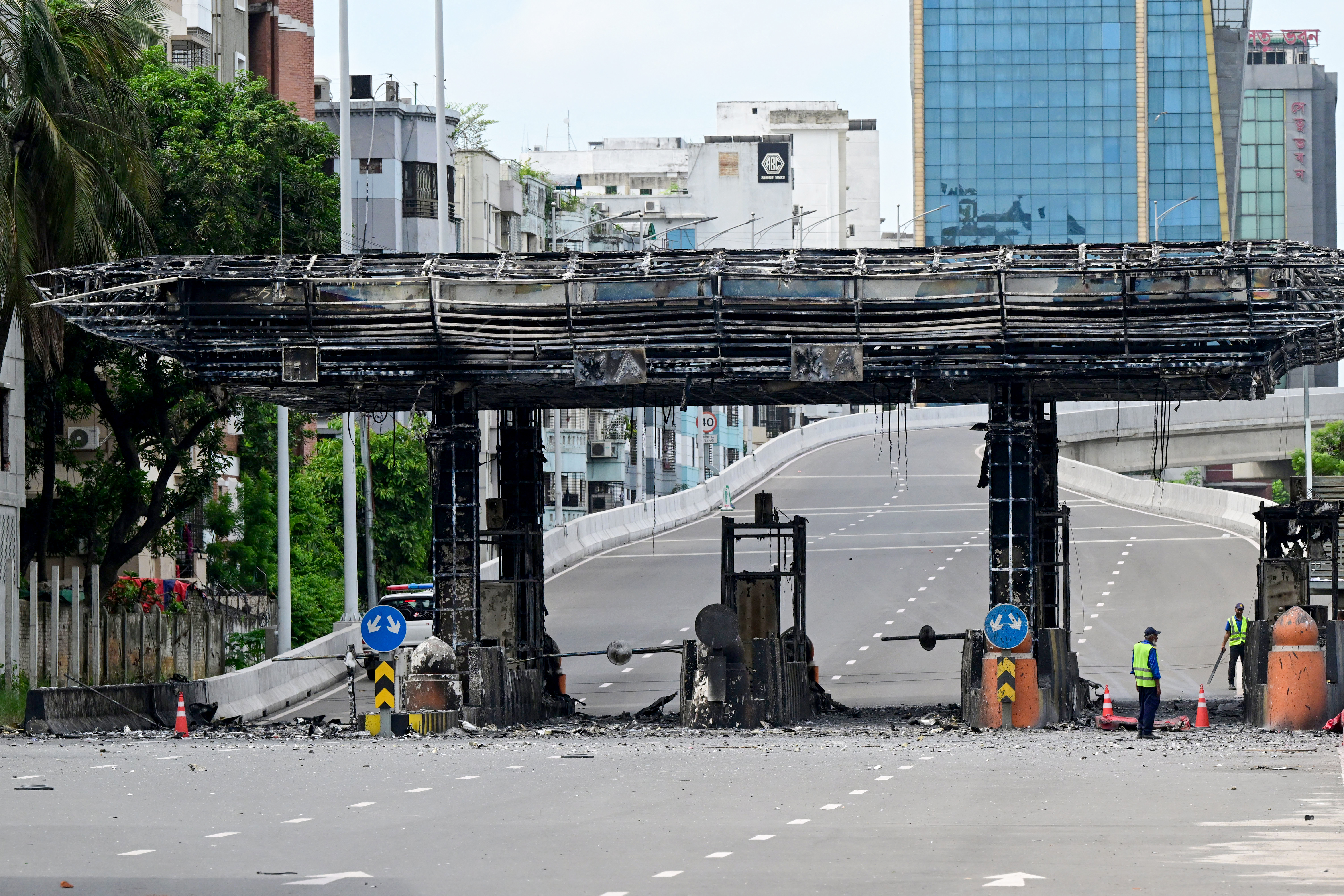 A burnt toll plaza is pictured after students set them on fire amid the ongoing anti-quota protest in Dhaka