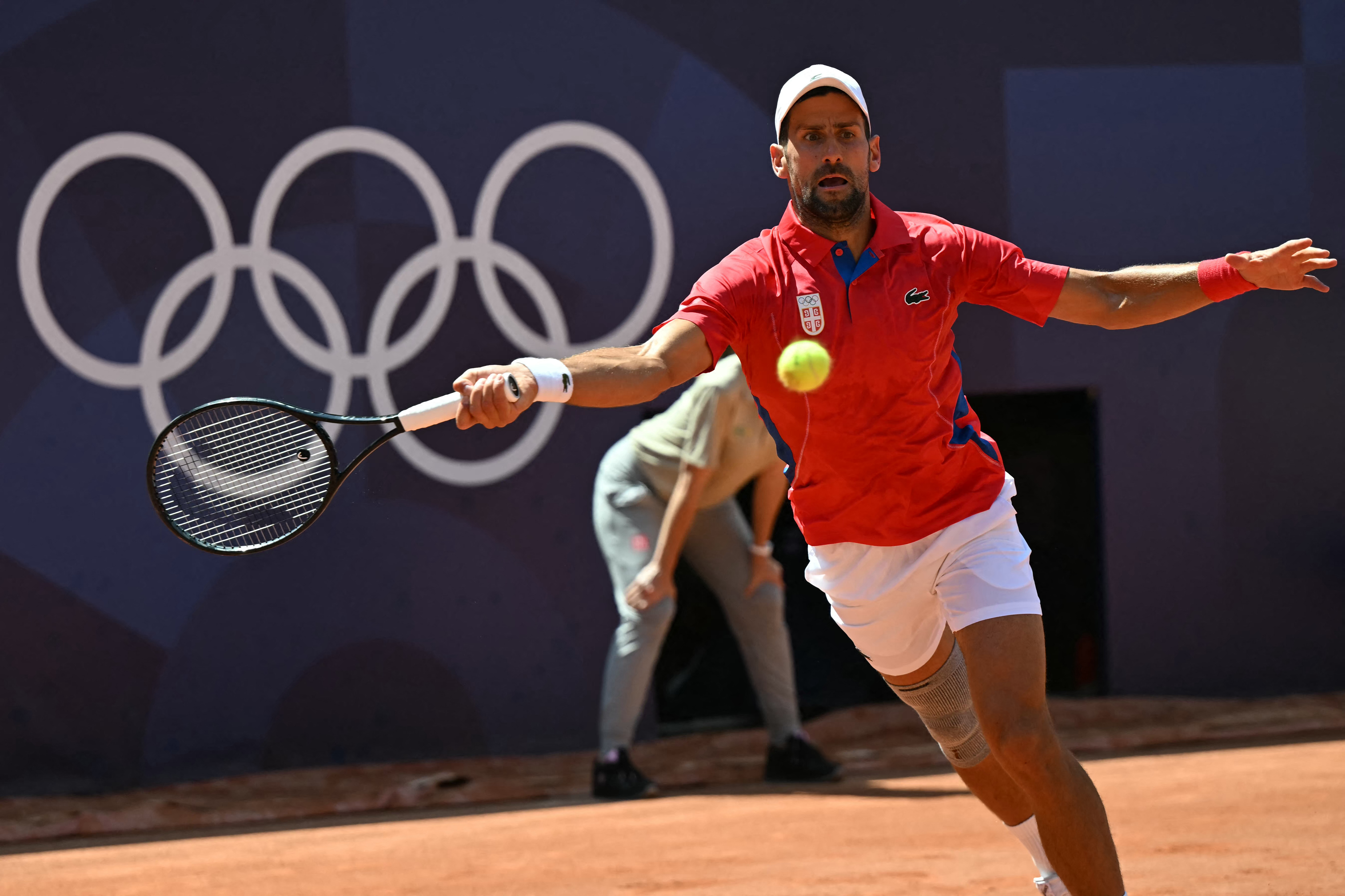 Serbia’s Novak Djokovic returns to Spain’s Rafael Nadal during their men’s singles second-round tennis match at the Paris 2024 Olympic Games