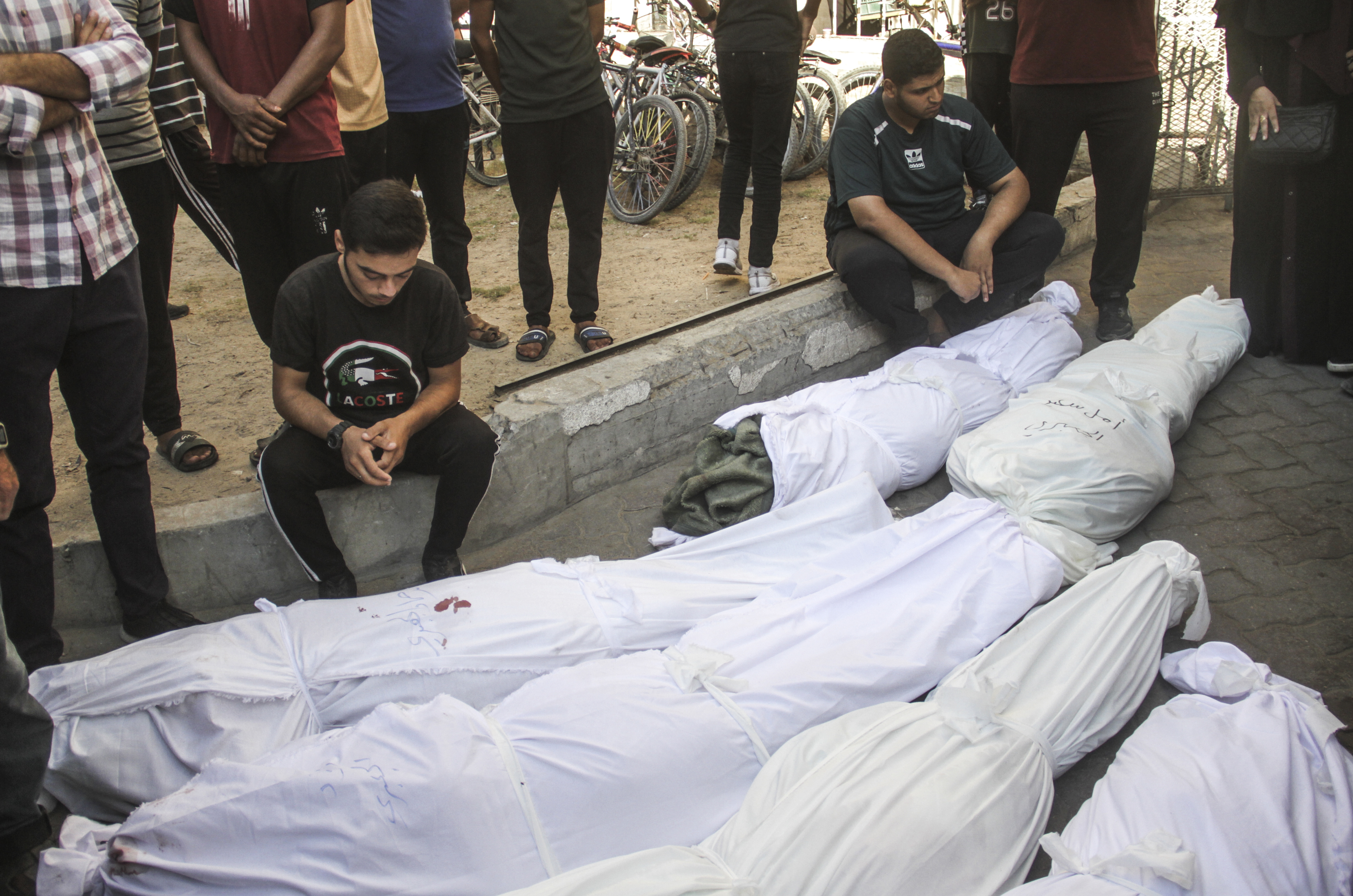 Palestinians mourn their dead following an Israeli strike on the Al-Taba'een school in the Daraj Tuffah neighborhood of Gaza, 10 August 2024.