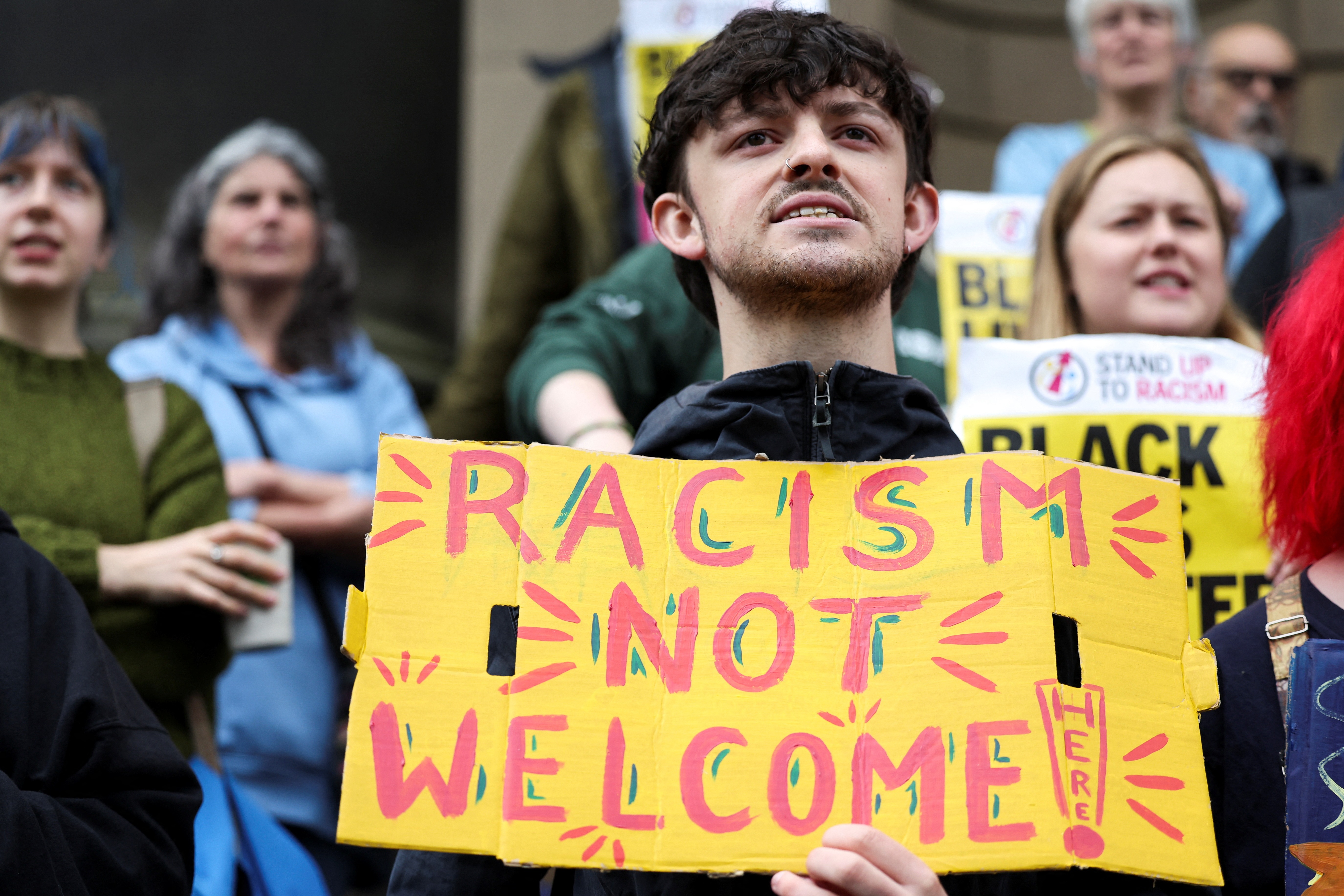 A man takes part in an anti-racism protest in Lancaster, Britain, August 4, 2024. REUTERS/Manon Cruz