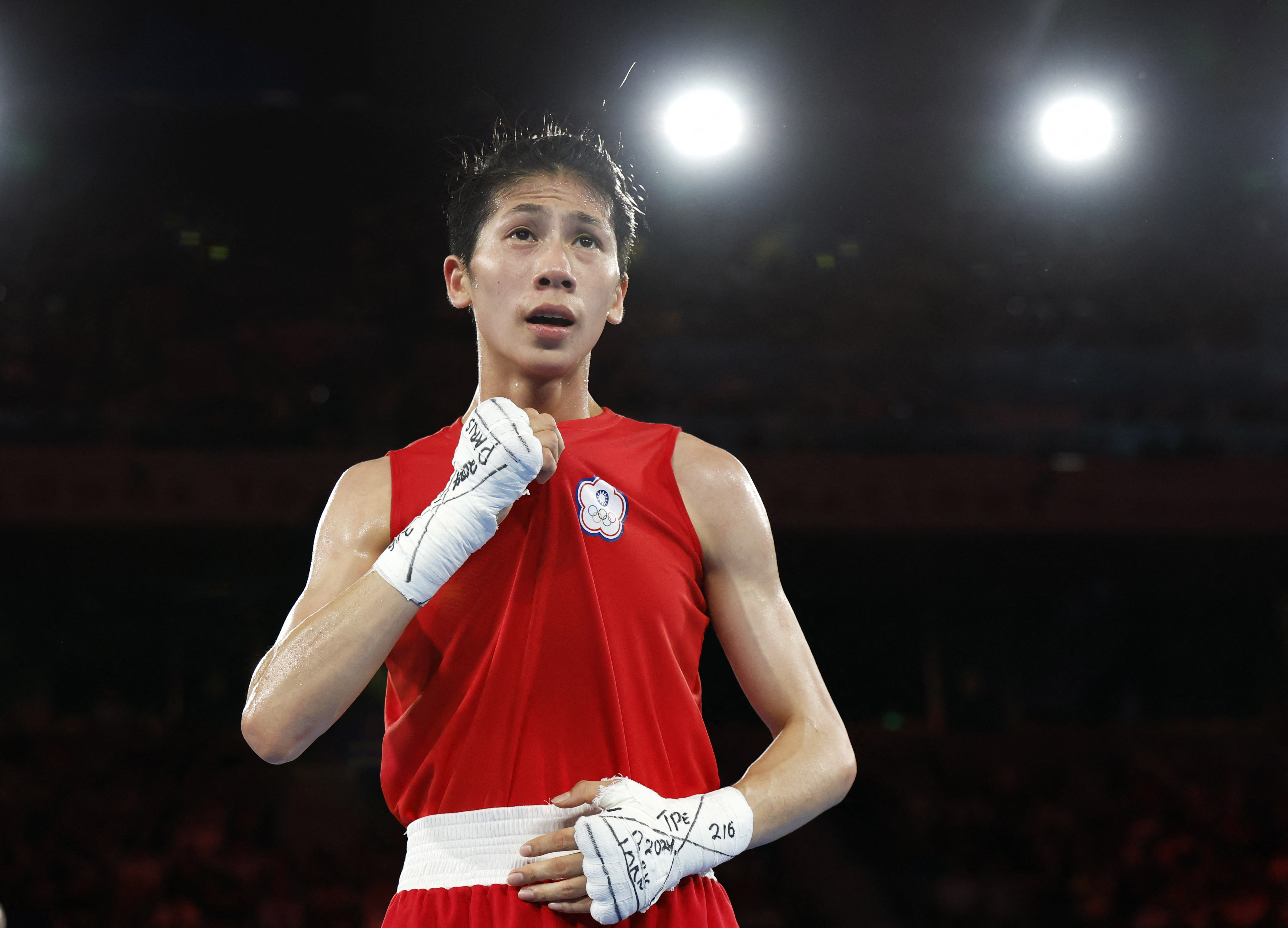 Paris 2024 Olympics - Boxing - Women's 57kg - Semifinal - Roland-Garros Stadium, Paris, France - August 07, 2024. Yu Ting Lin of Taiwan celebrates after winning her fight against Esra Yildiz Kahraman of Turkey. REUTERS/Peter Cziborra