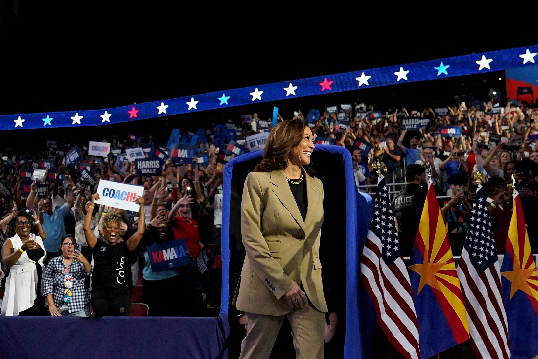 U.S. Vice President and Democratic presidential candidate Kamala Harris attends a campaign rally held along with Democratic vice presidential candidate, Minnesota Governor Tim Walz, in Glendale, Arizona, U.S., August 9, 2024. REUTERS/Elizabeth Frantz TPX IMAGES OF THE DAY