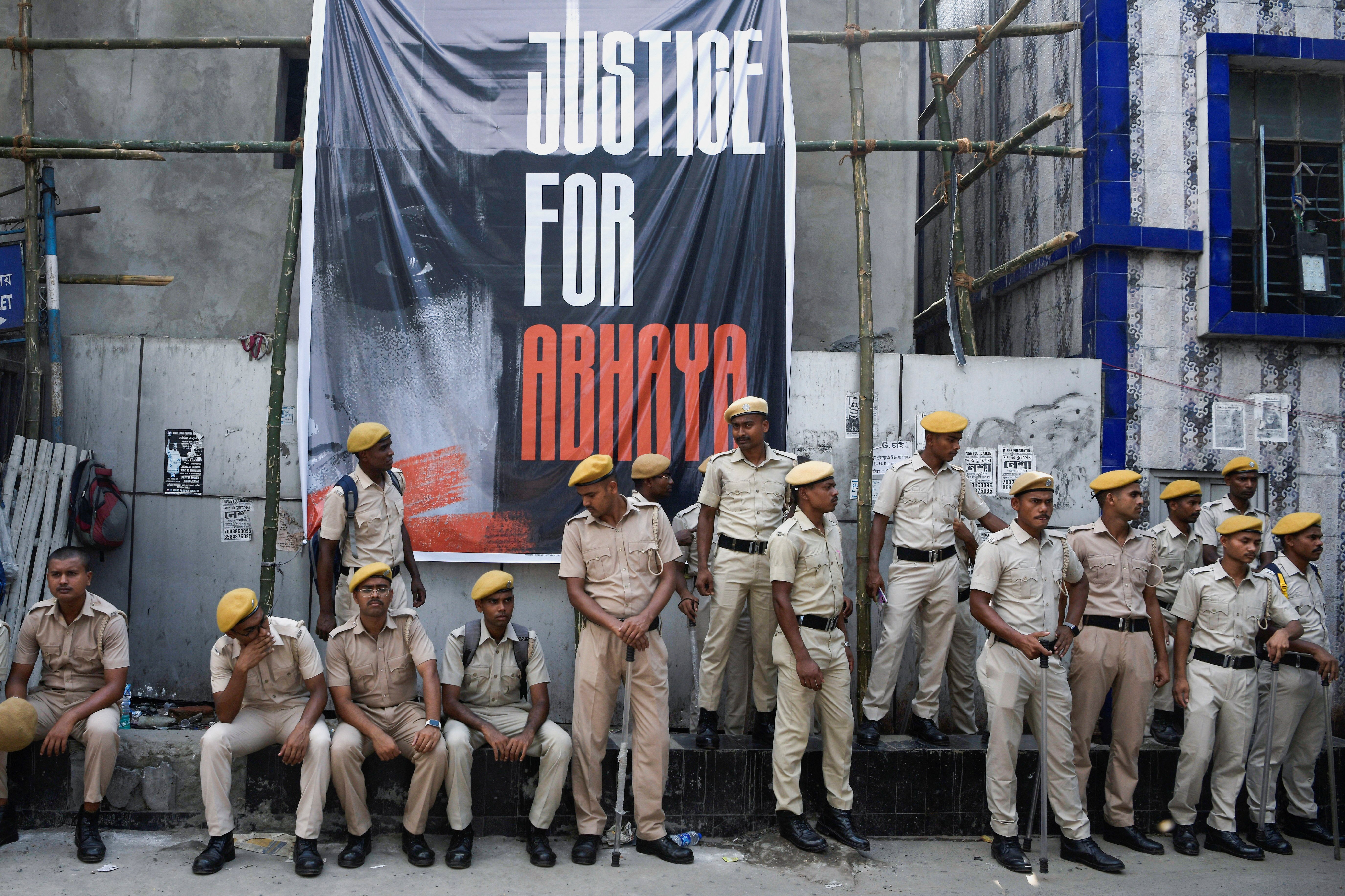 Police officers gather outside R. G. Kar Medical College on the day of a nationwide strike by the Indian Medical Association to protest the rape and murder of a trainee medic at the government-run hospital in Kolkata, India, August 17, 2024. REUTERS/Avijit Ghosh