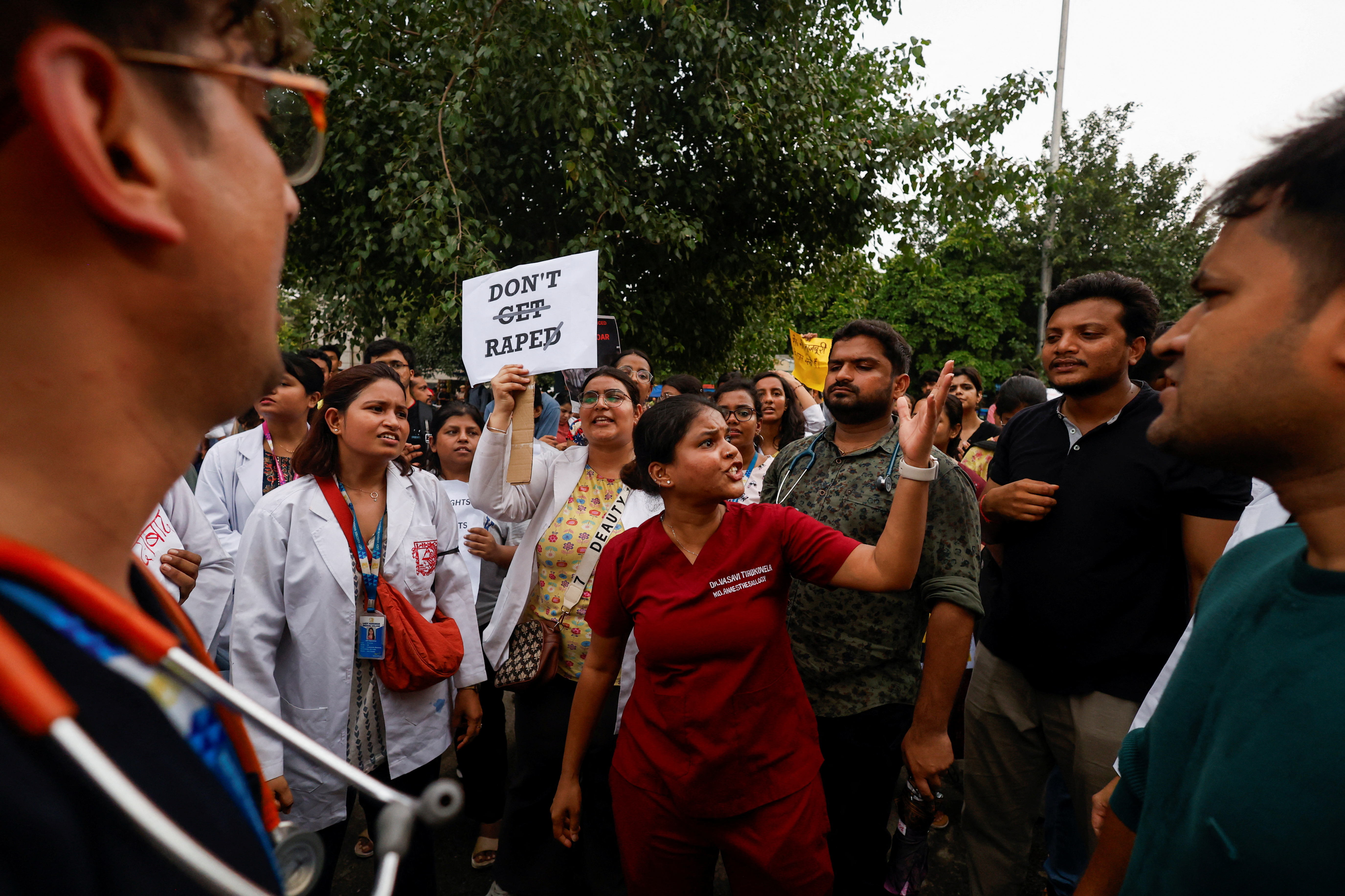 Doctors shout slogans as they hold placards during a protest rally demanding justice following the rape and murder of a trainee medic at a hospital in Kolkata, in New Delhi, India, August 17, 2024. REUTERS/Priyanshu Singh