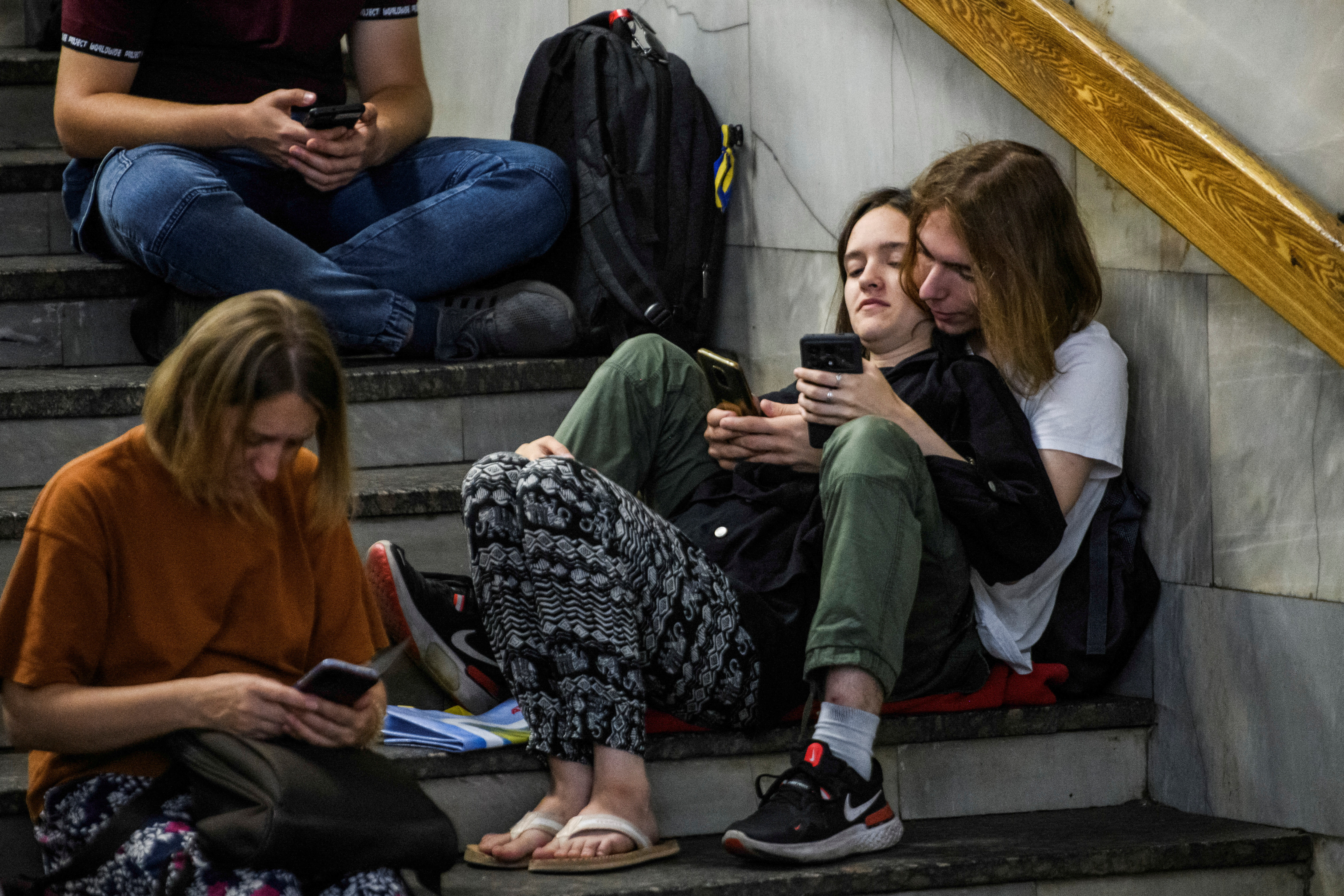 People take cover inside a metro station during a Russian missile and drone strike, amid Russia's attack on Ukraine, in Kyiv, Ukraine August 26, 2024. REUTERS/Vladyslav Musiienko