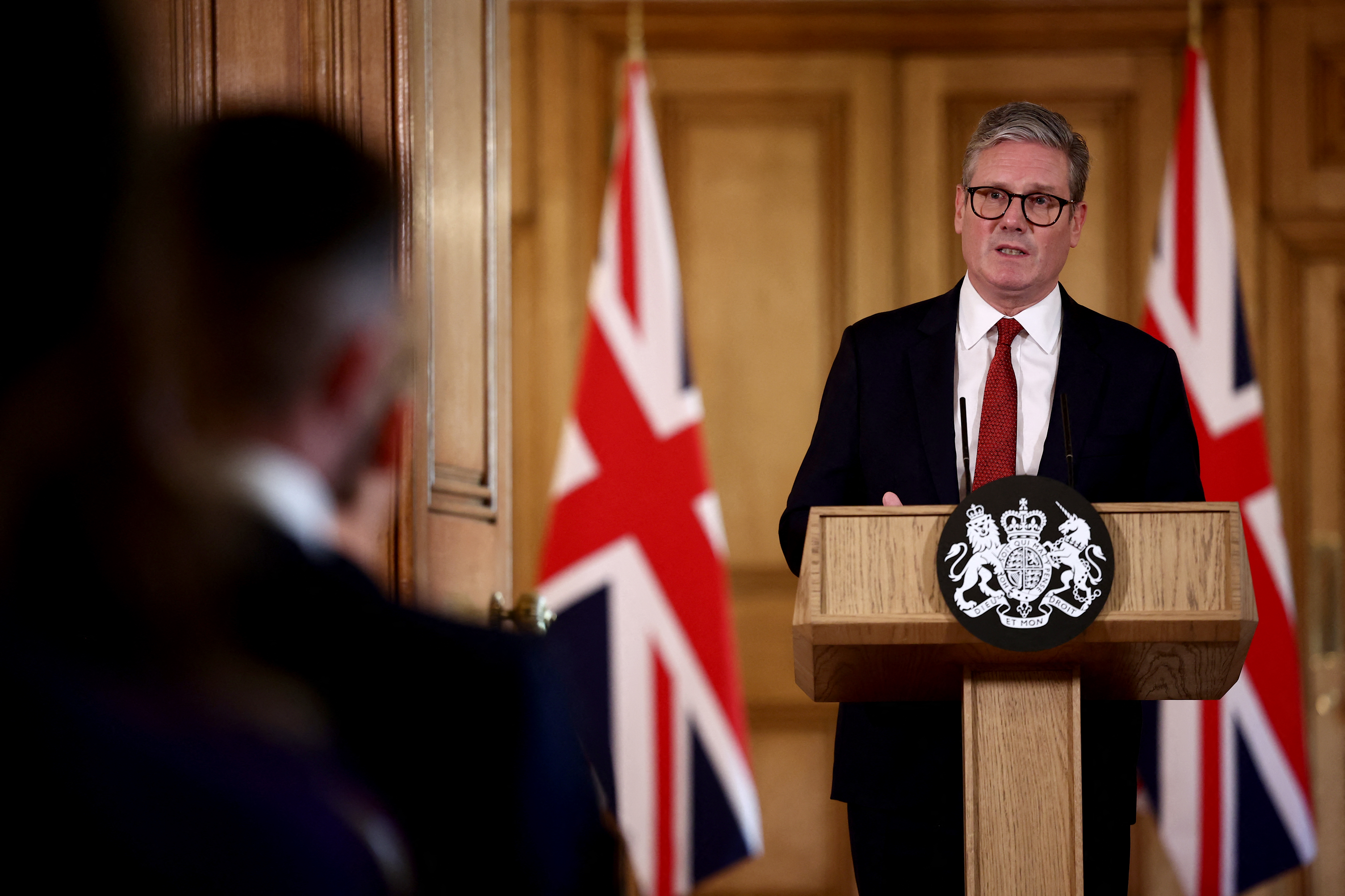 Britain's Prime Minister Keir Starmer delivers a speech during a press conference following clashes after the Southport stabbing, at 10 Downing street in central London on August 1, 2024. - The UK has been rocked in recent days by violent disorder following a knife attack targeting children, with already ascendant anti-immigration far-right elements accused of hijacking the response to the tragedy. (Photo by HENRY NICHOLLS / AFP)