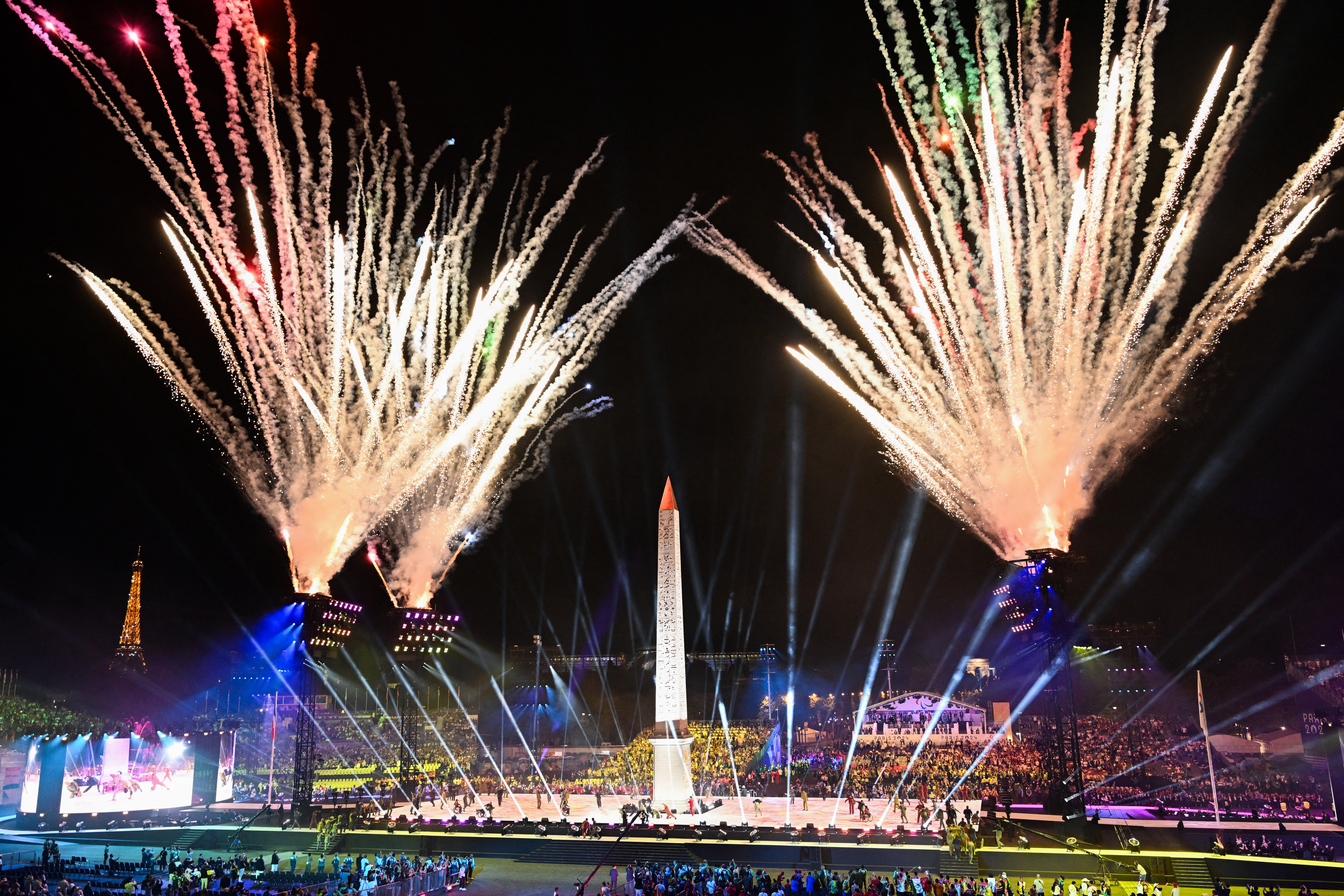 This photograph shows fireworks during the Paris 2024 Paralympic Games Opening Ceremony at the Place de la Concorde with the Obelisque de Louxor (Luxor Obelisk) in Paris on August 28, 2024. (Photo by Bertrand GUAY / AFP)