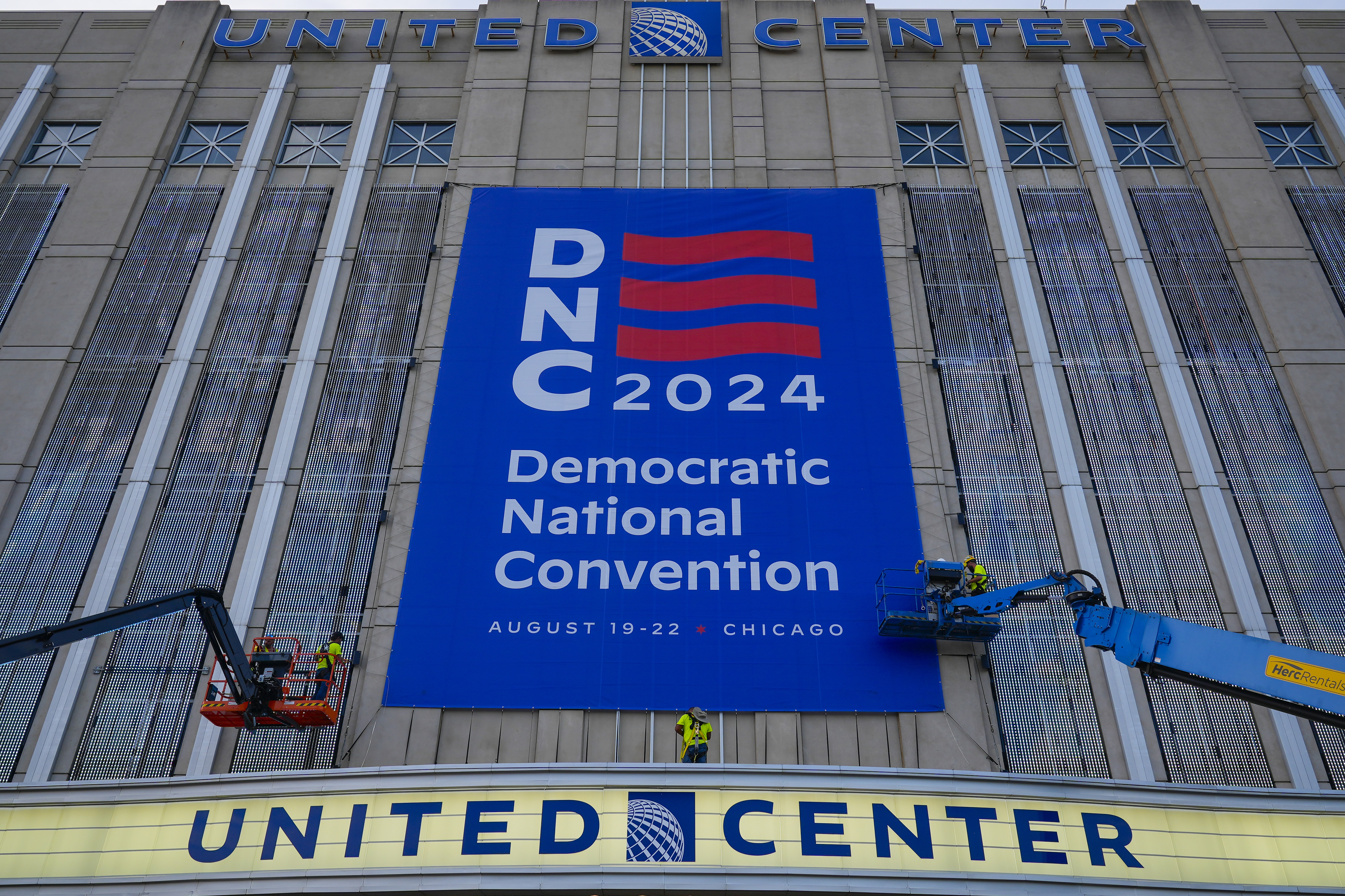 A sign outside the United Center reads, "DNC 2024: Democratic National Convention."
