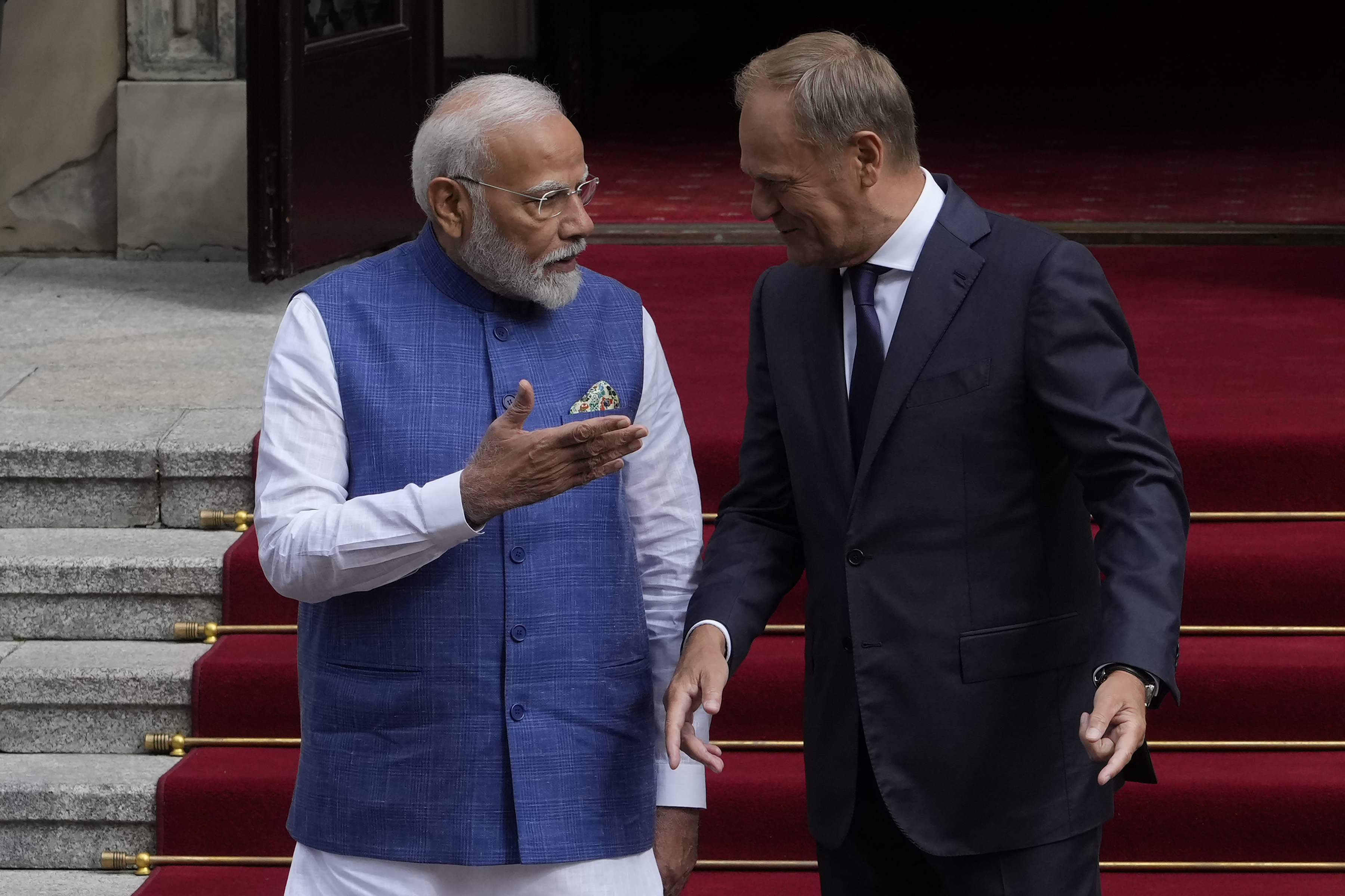 Indian Prime Minister Narendra Modi, left, is greeted by his Polish counterpart Donald Tusk, right, before talks in Warsaw, Poland, Thursday, Aug. 22, 2024. (AP Photo/Czarek Sokolowski)