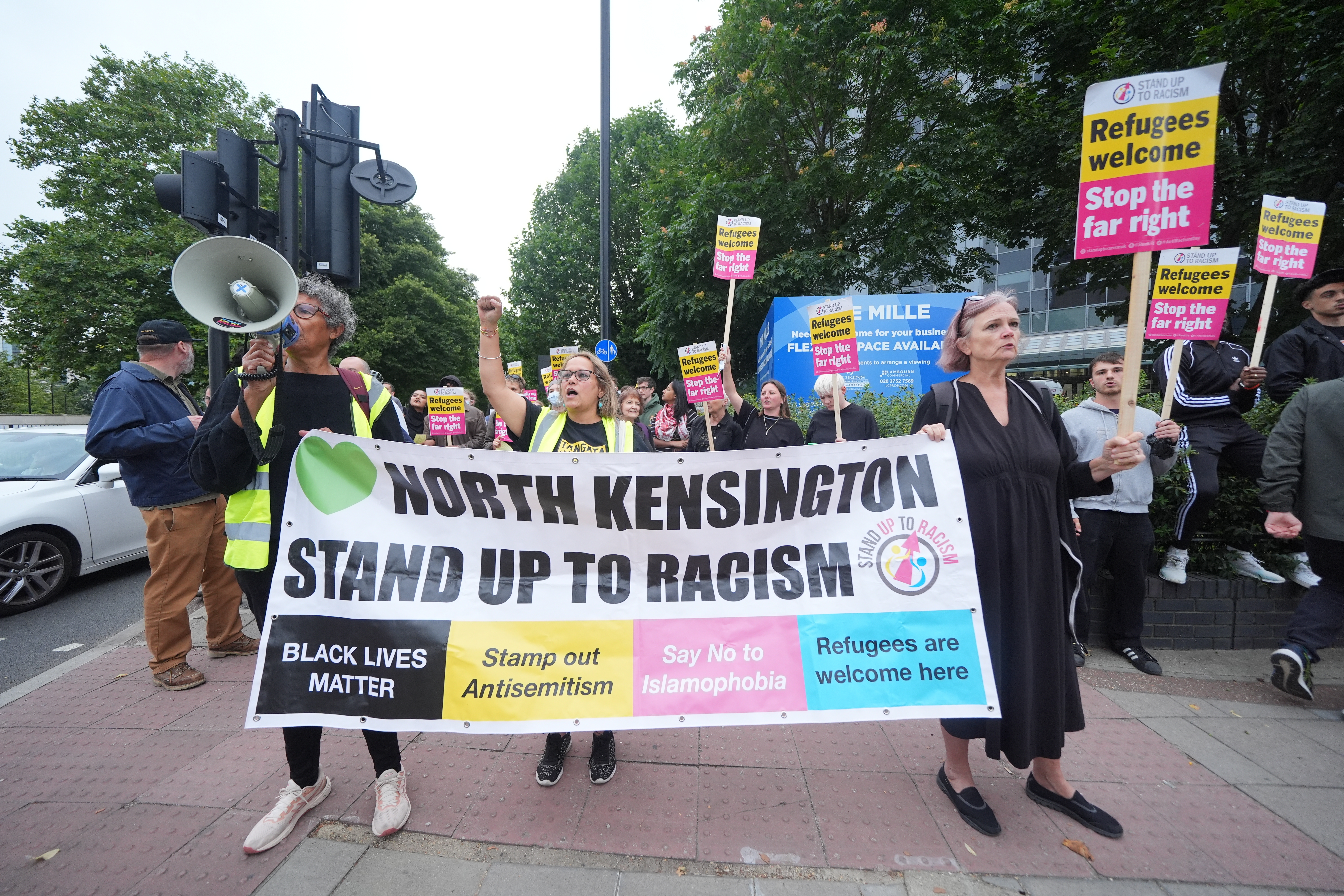 People take part in an anti-immigration protest outside UK Immigration Help in Brentford, London. Picture date: Wednesday August 7, 2024. (Photo by PA Wire/PA Images via Getty Images)