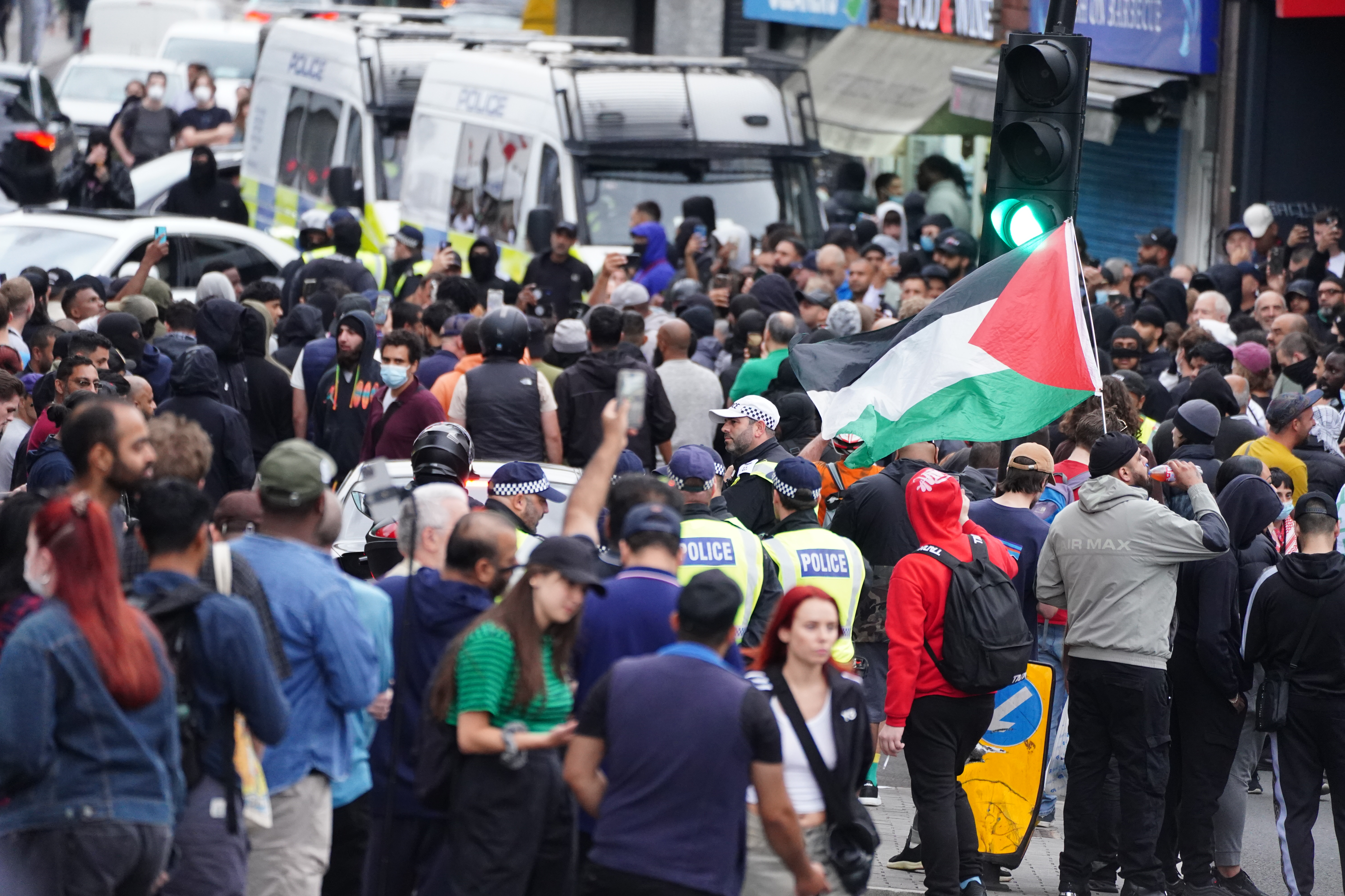 Counter protesters ahead of an anti-immigration protest outside in Walthamstow high street, Walthamstow, London. Picture date: Wednesday August 7, 2024. (Photo by PA Wire/PA Images via Getty Images)
