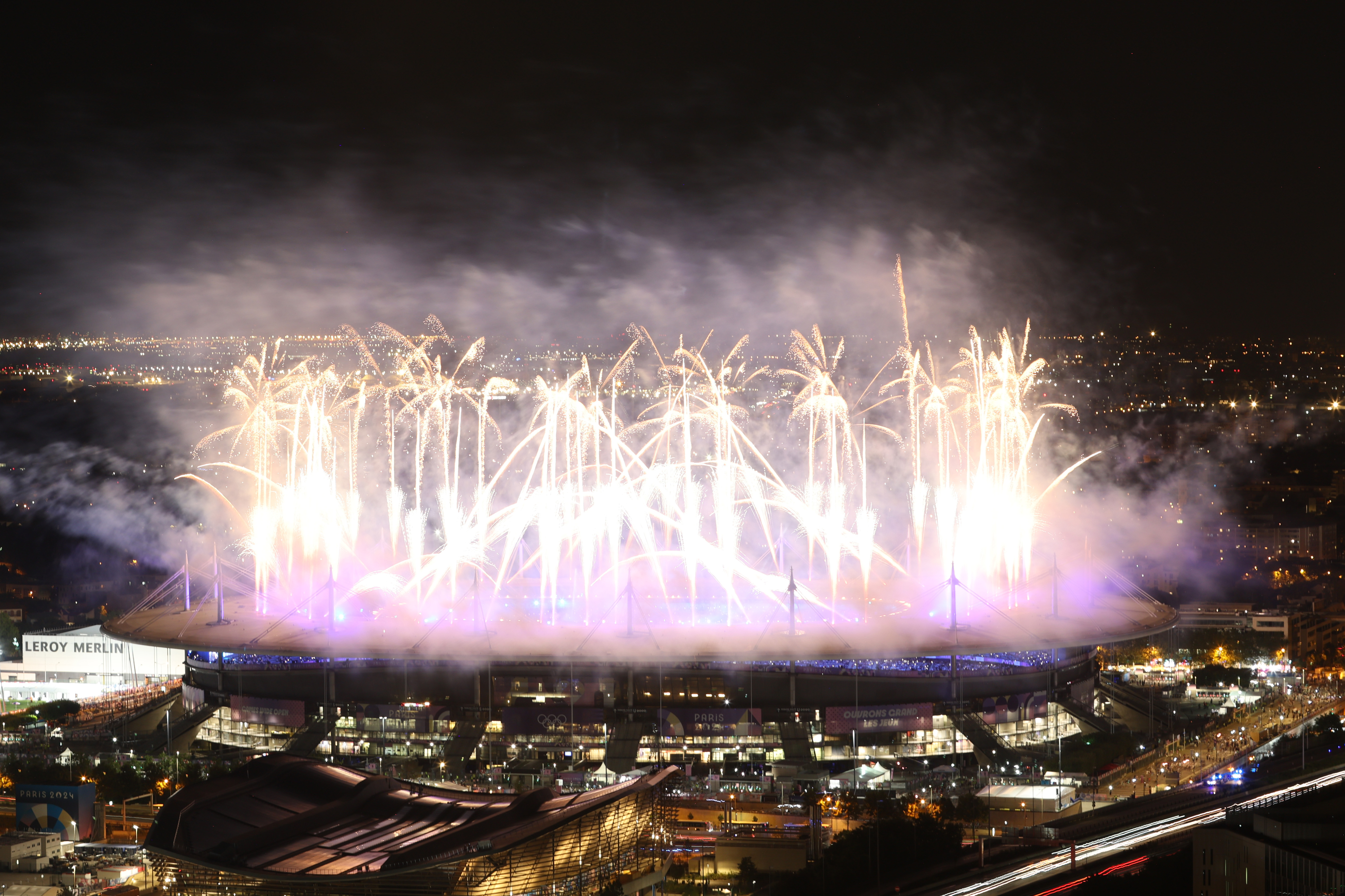 A general view of the inside of the stadium as French Singer-Songwriter Yseult performs “My Way” as a Pyrotechnics Display takes place during the Closing Ceremony of the Olympic Games