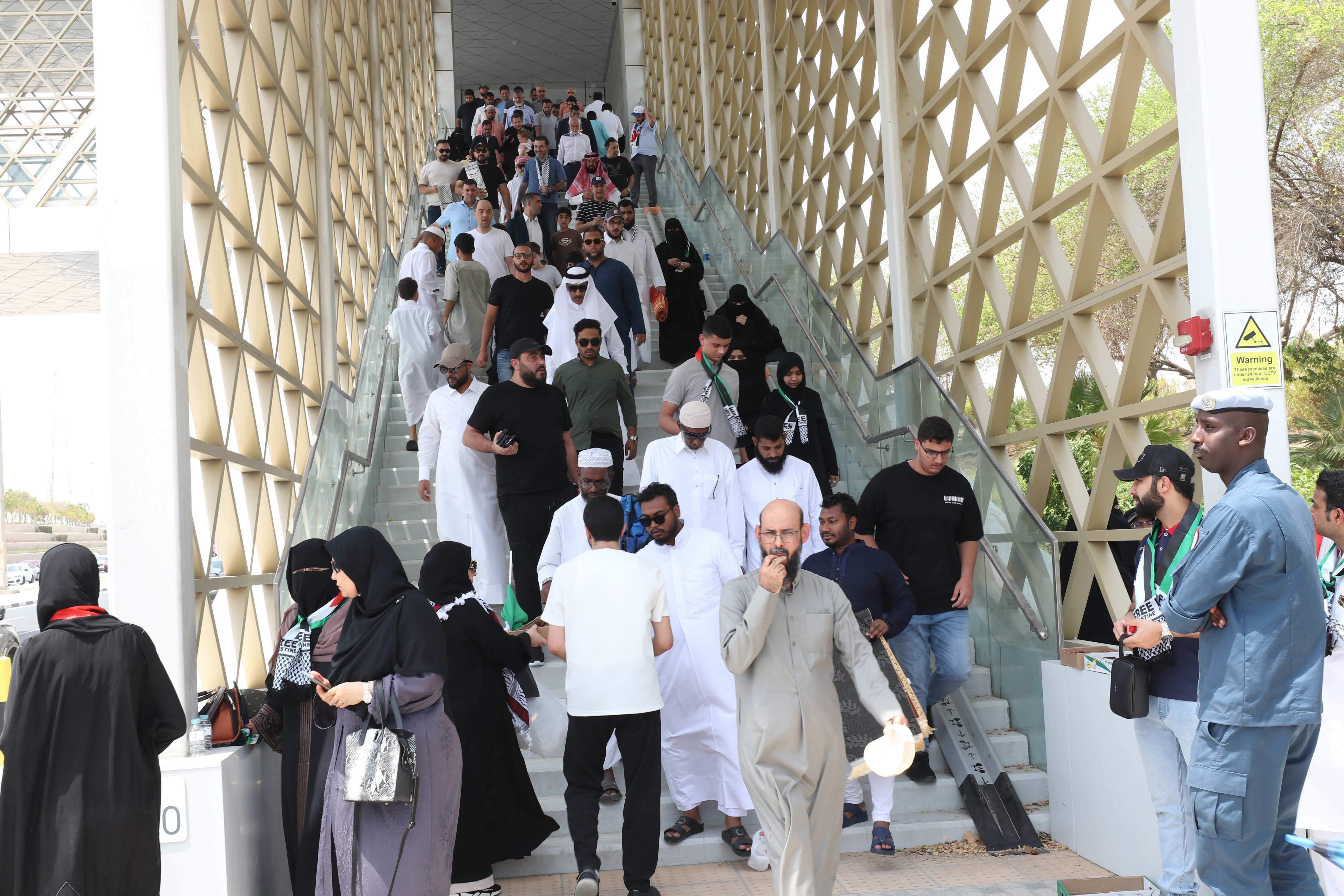 People gather at Imam Muhammad ibn Abd al-Wahhab Mosque in Doha for Friday prayer before the burial of Hamas leader Ismail Haniyeh