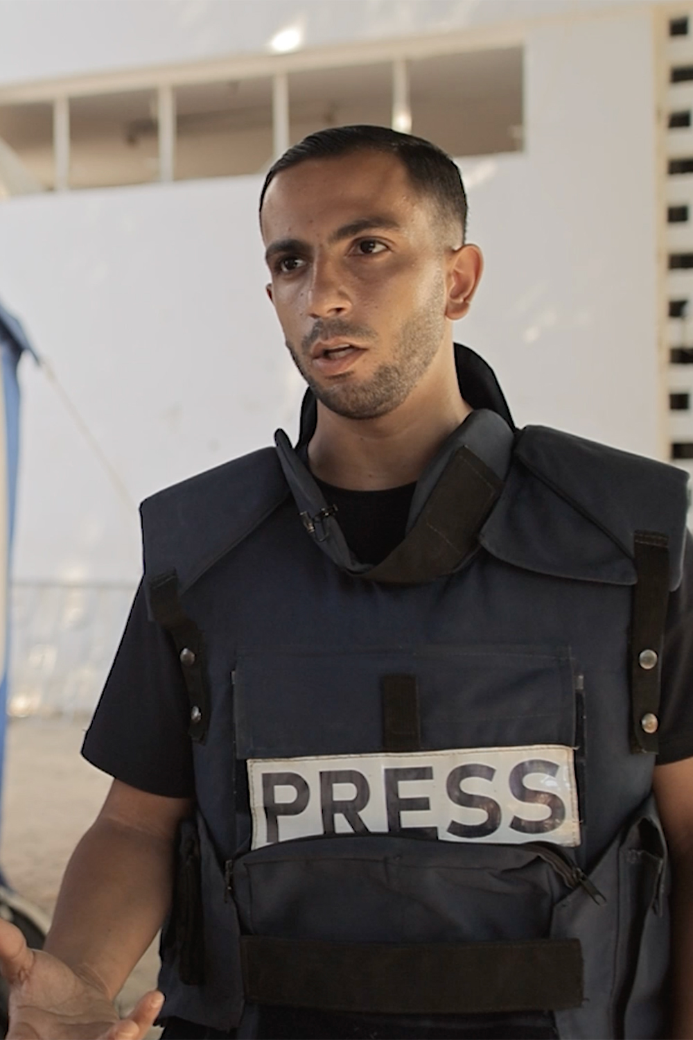 Al Jazeera journalist Anas al-Sharif in the aftermath of the Israeli bombing of the al-Tabin School in northern Gaza