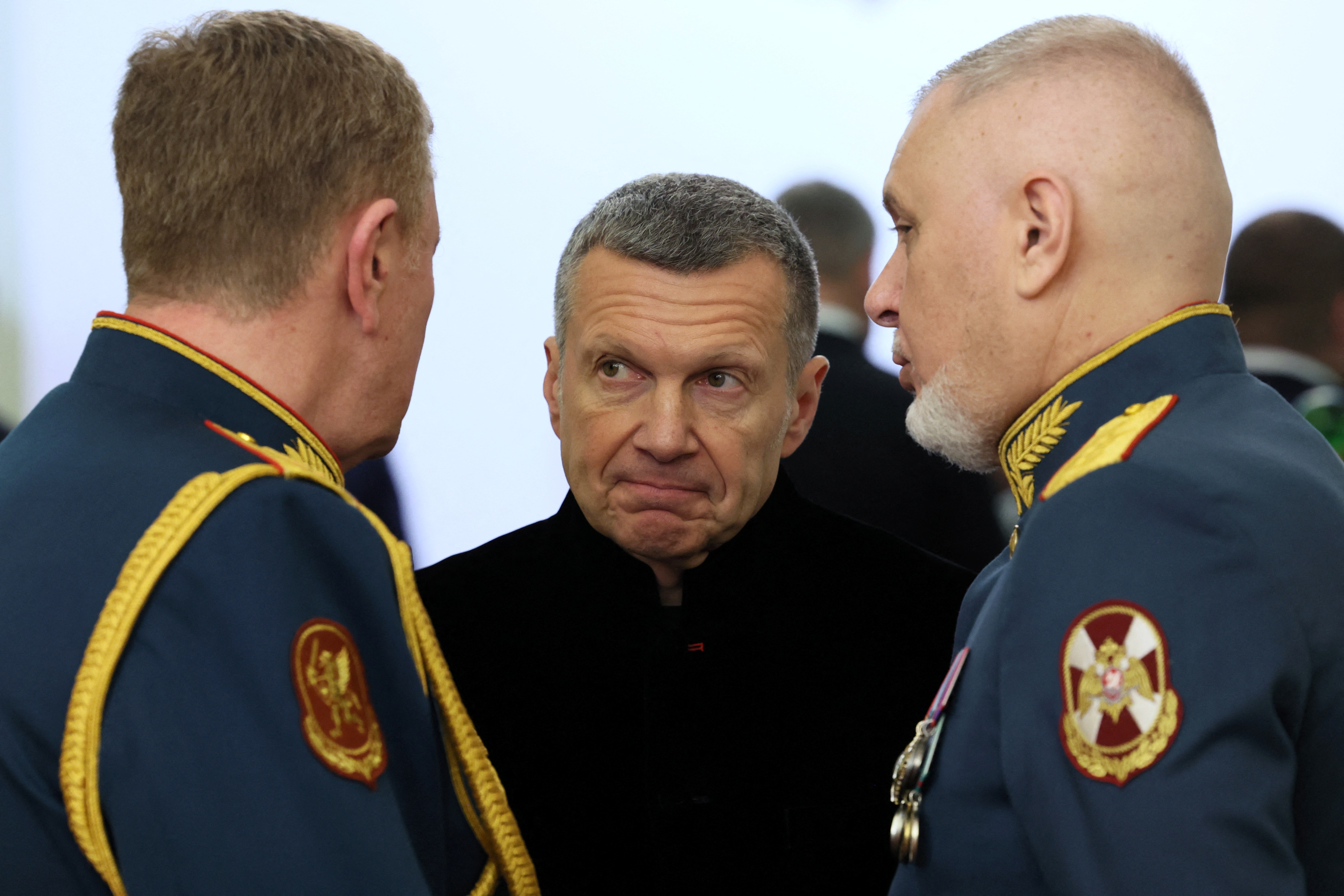 Russian TV presenter Vladimir Solovyov talks to service members before a ceremony inaugurating Vladimir Putin as President of Russia at the Kremlin in Moscow, Russia May 7, 2024. Sputnik/Sergei Savostyanov/Pool via REUTERS ATTENTION EDITORS - THIS IMAGE WAS PROVIDED BY A THIRD PARTY.