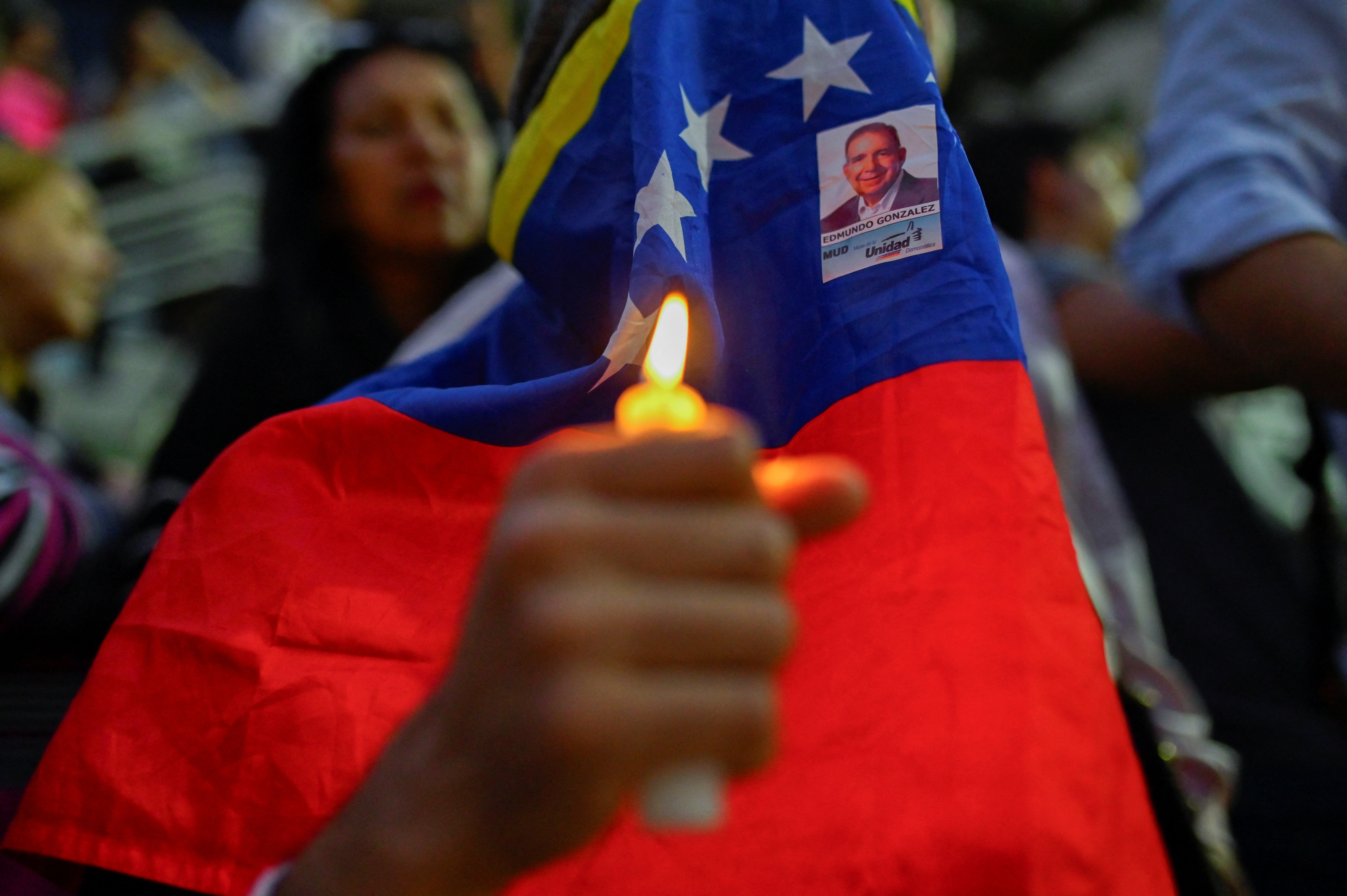 Protestors hold a vigil for those detained by Venezuelan security forces
