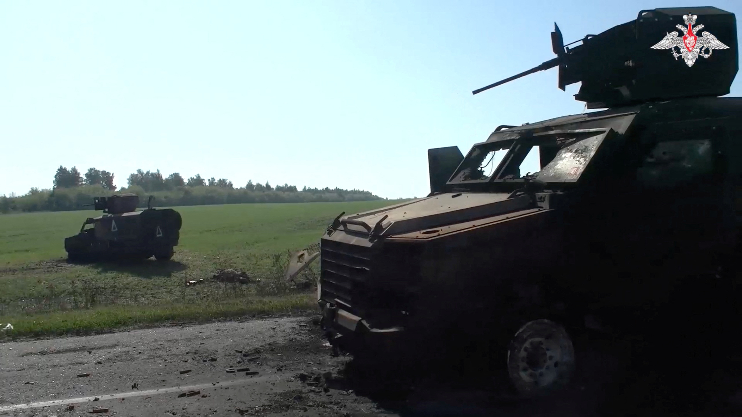 A view shows damaged military vehicles, what is said to be a Ukrainian convoy destroyed by soldiers of the Russian naval infantry in the course of Russia-Ukraine conflict in the Kursk region, Russia, in this still image from video released August 20, 2024. Russian Defence Ministry/Handout via REUTERS ATTENTION EDITORS - THIS IMAGE HAS BEEN SUPPLIED BY A THIRD PARTY. NO RESALES. NO ARCHIVES. MANDATORY CREDIT. WATERMARK FROM SOURCE.