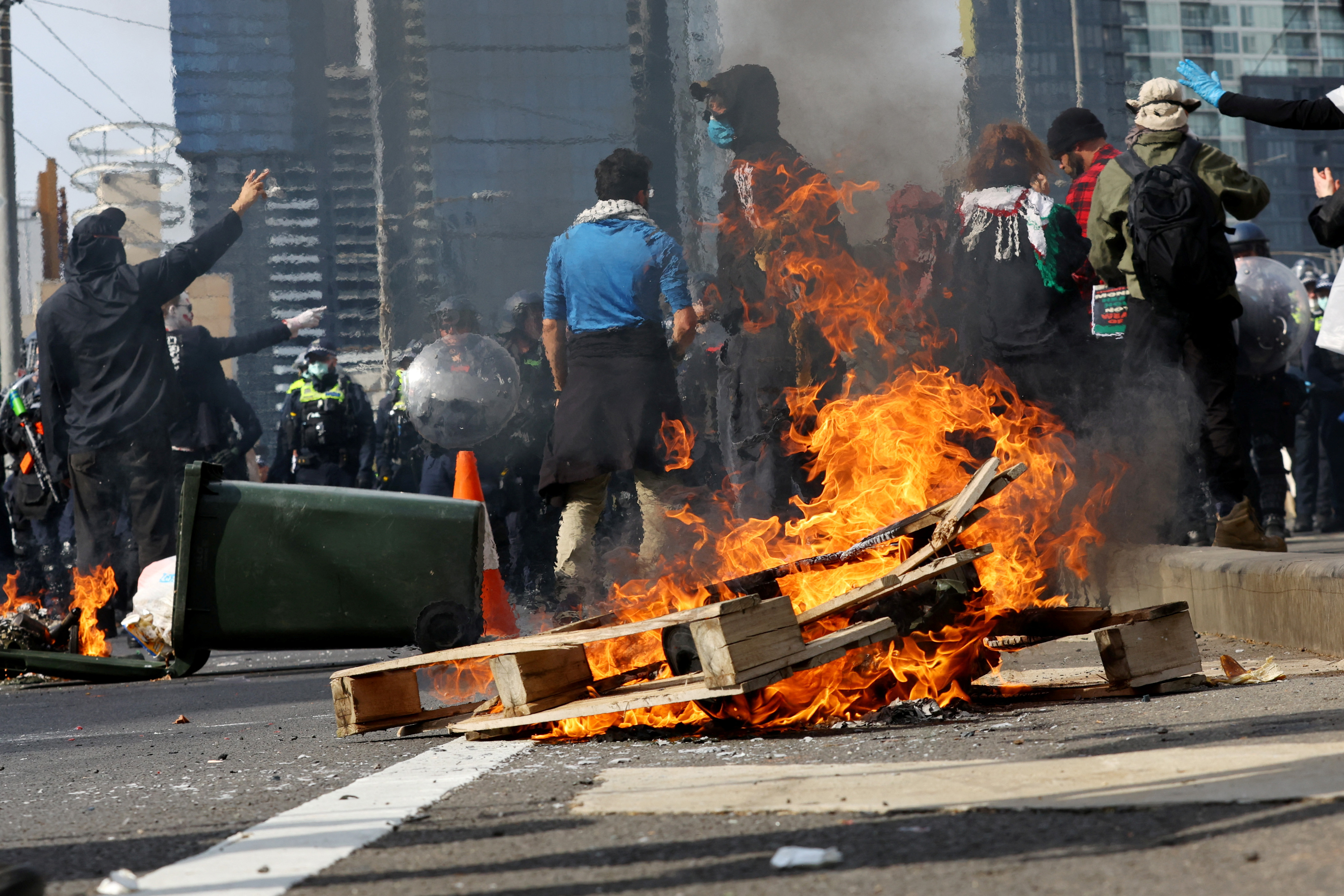 Anti-war protesters clash with police at Melbourne weapons expo