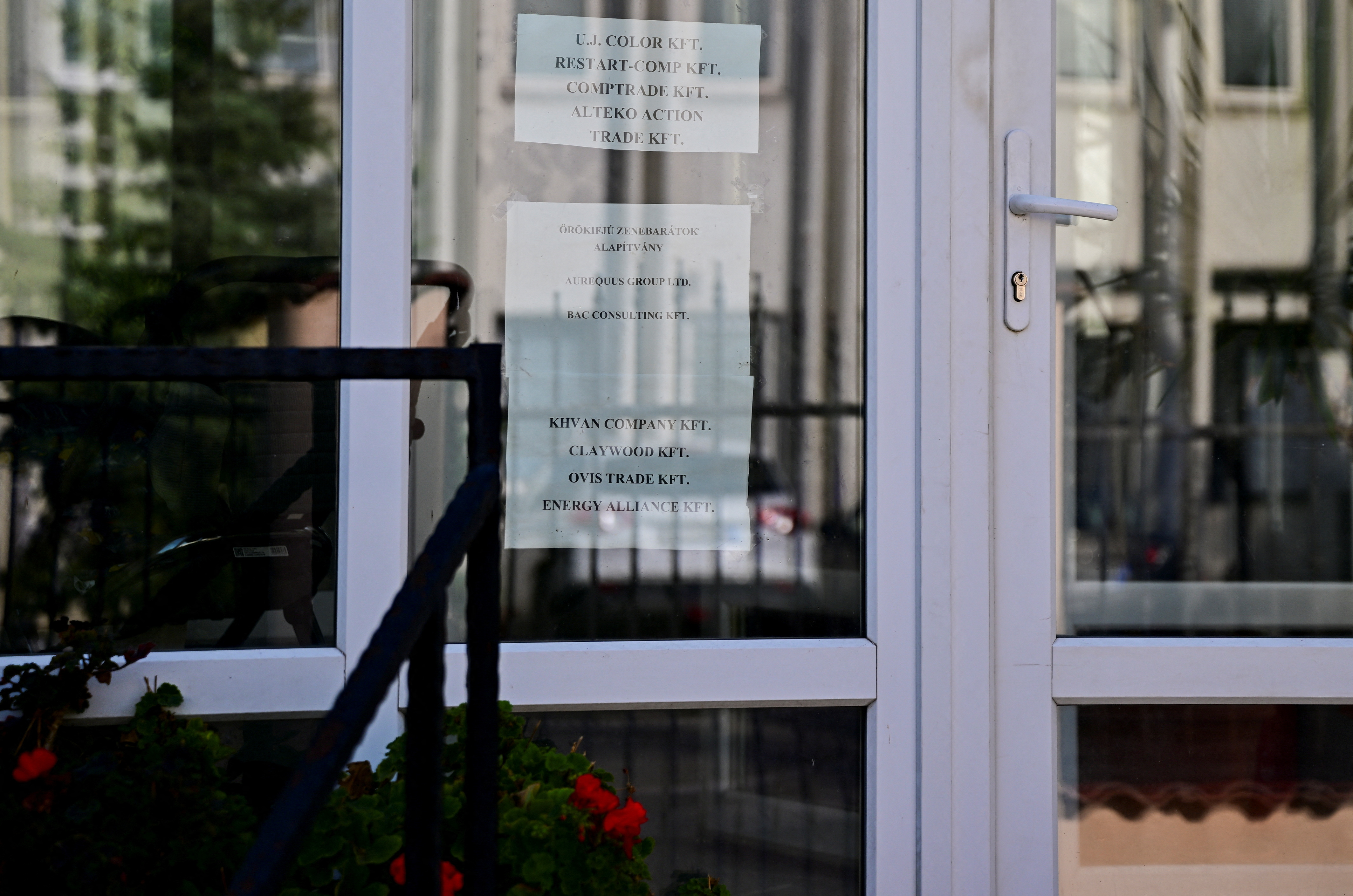 The name of BAC Consulting KFT is listed on paper pasted on the window of an office building where the company is said to be registered, in Budapest, Hungary, September 18, 2024.