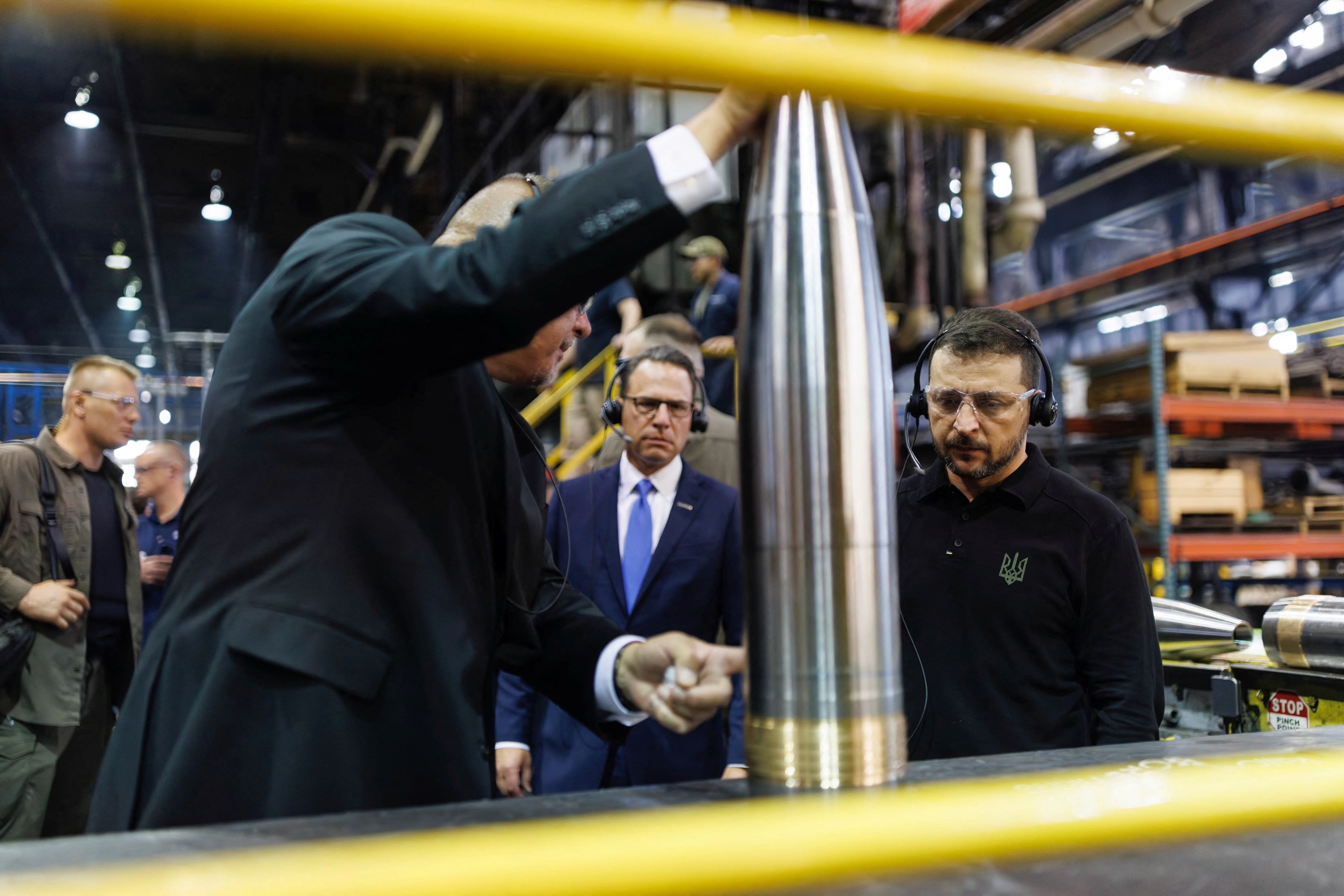 Ukraine's President Volodymyr Zelenskiy stands near Pennsylvania Governor Josh Shapiro during his visit to the Scranton Army Ammunition Plant
