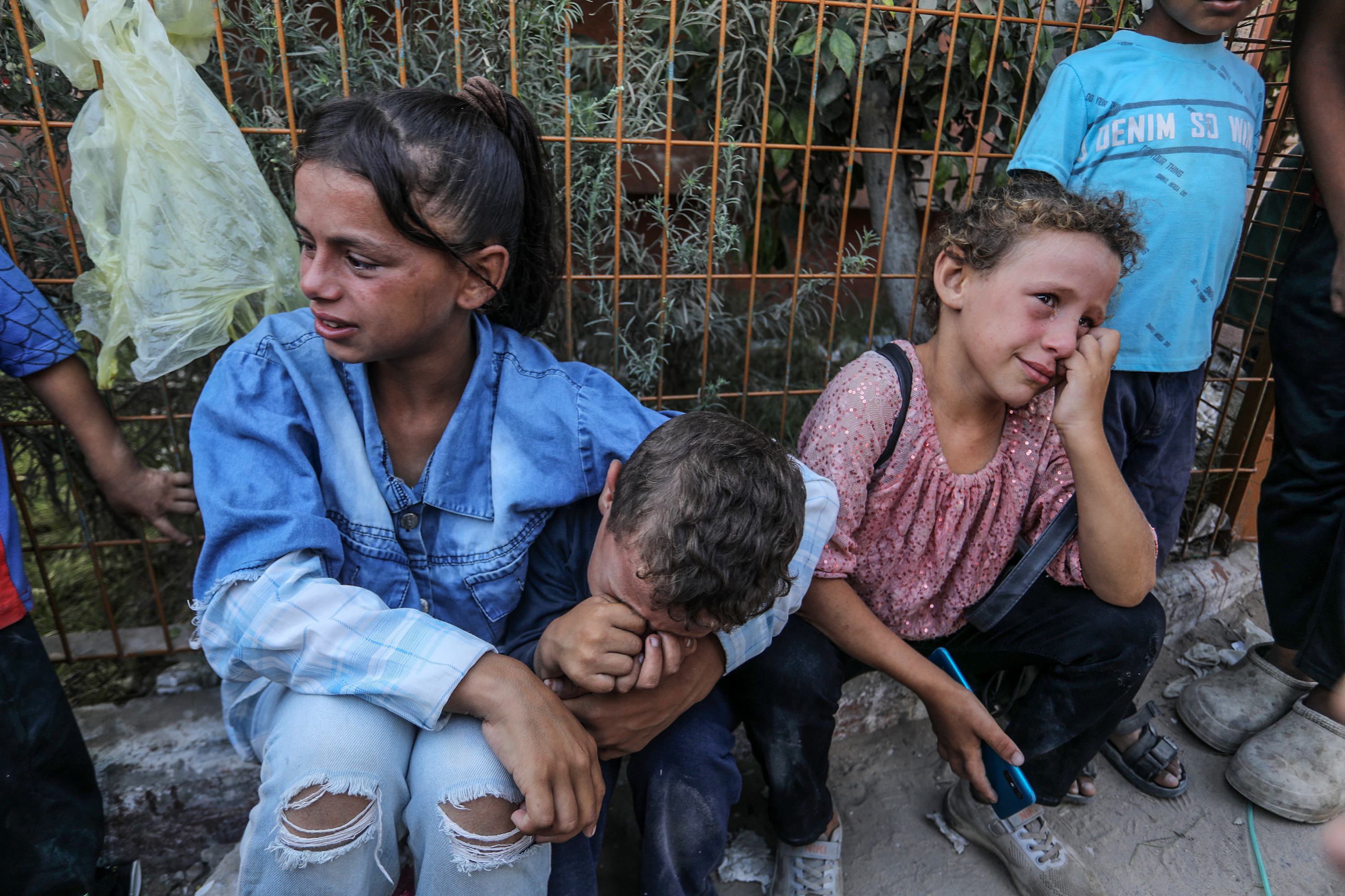 Relatives of the Palestinians who died as a result of Israeli attacks on Asdaa area