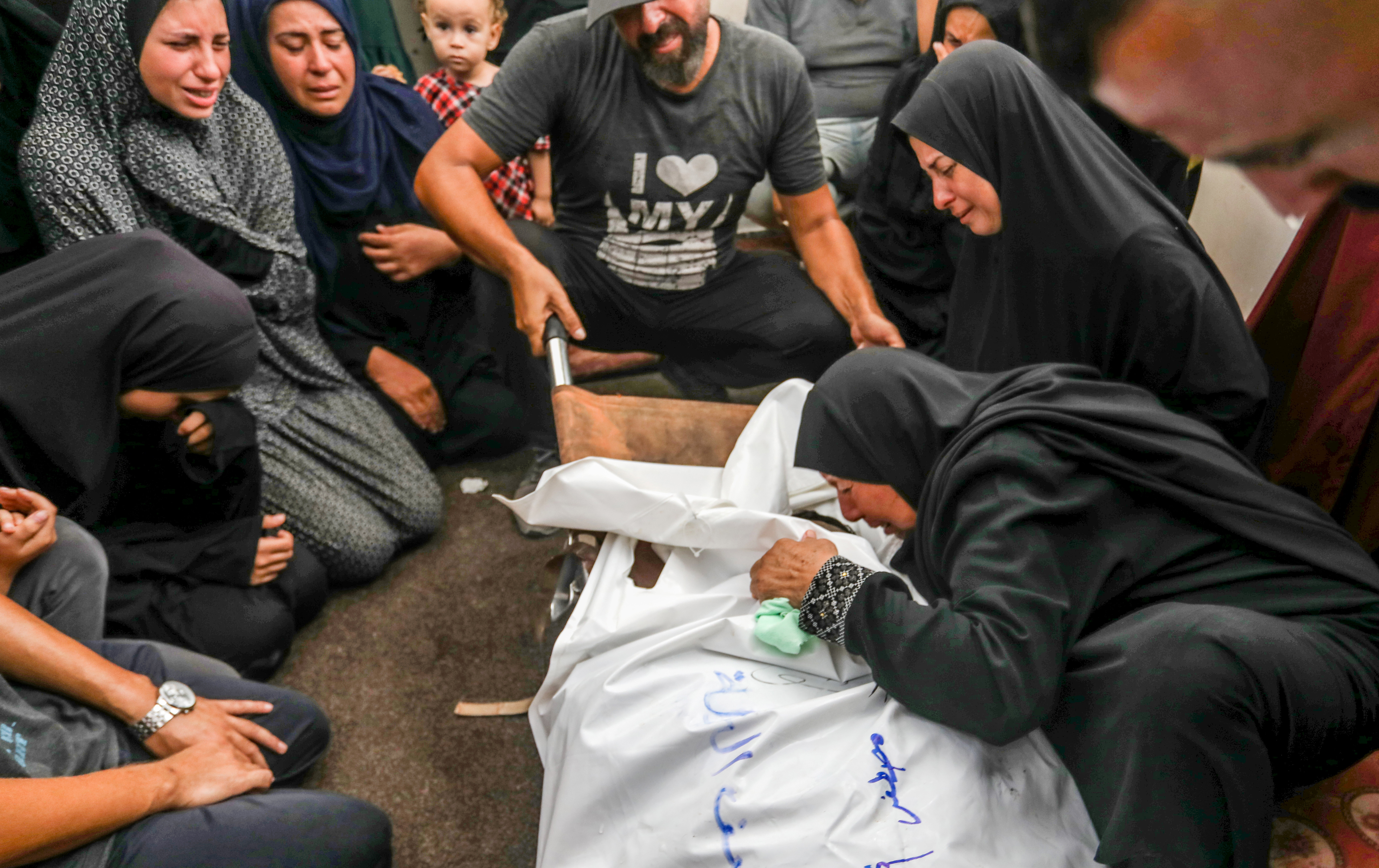 People gather for a funeral ceremony