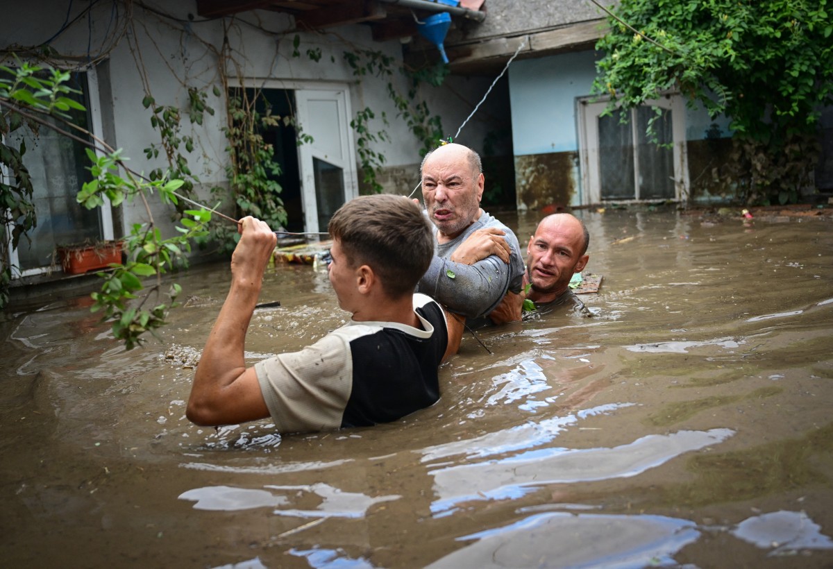 Four people found dead in Romania as floods leave hundreds stranded