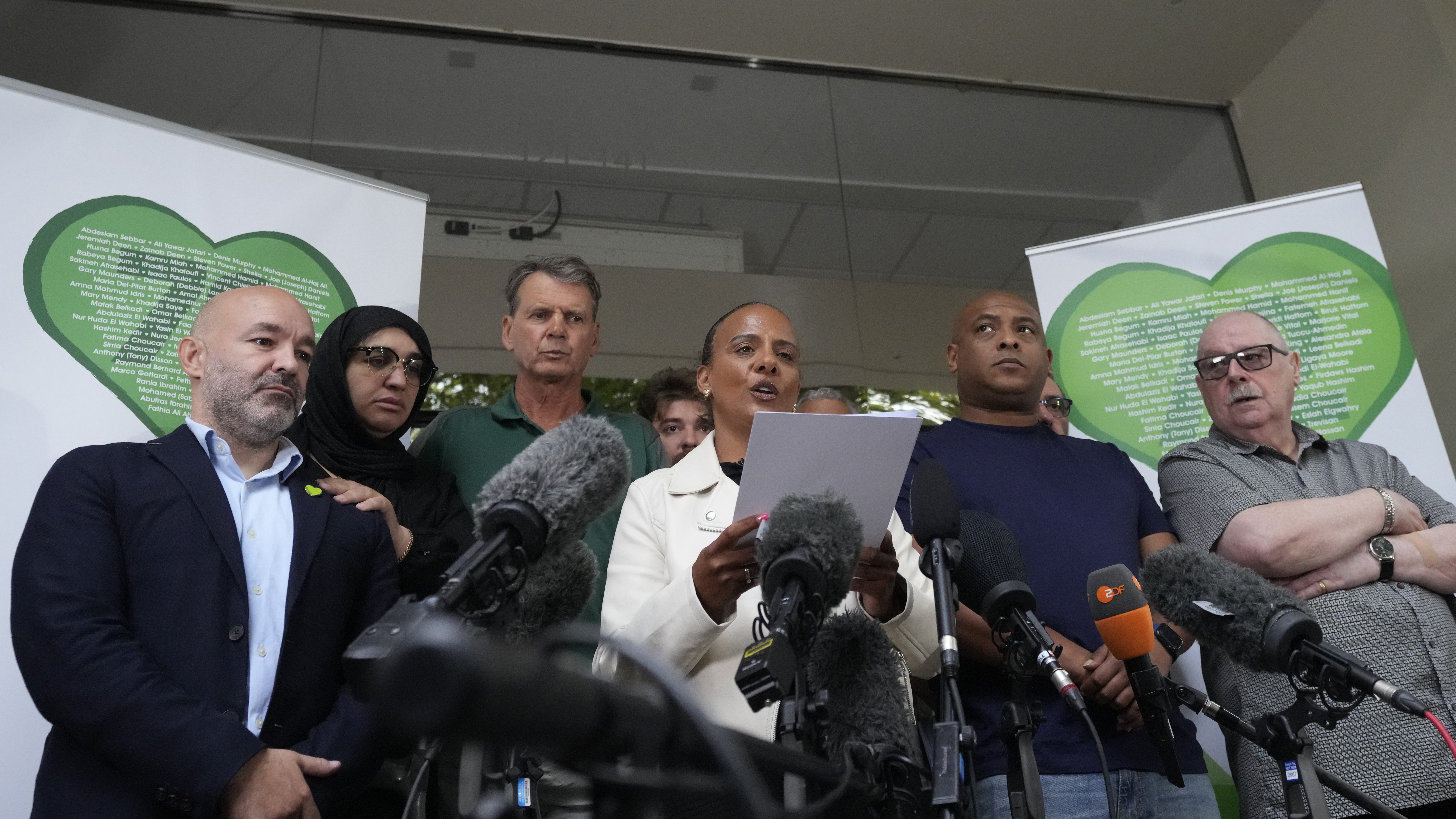 Natasha Elcock a survivor of the Grenfell Tower fire speaks to the media on behalf of relatives of the deceased and people directly affected by the fire a following the final report into the fire being released in London, Wednesday, Sept. 4, 2024.