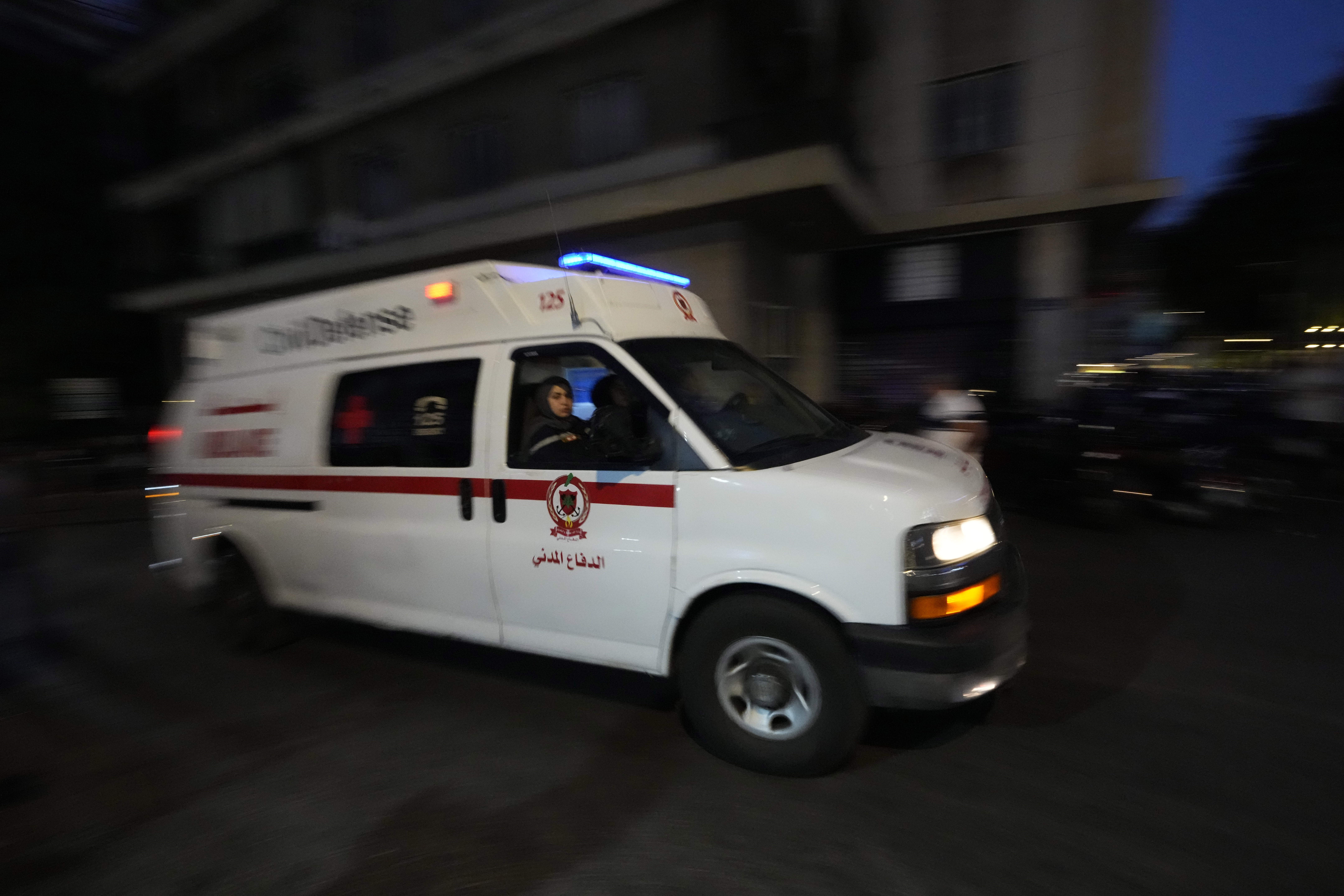 An ambulance carrying wounded people whose handheld pager exploded, arrive at the American University hospital in Beirut, Lebanon, Tuesday, Sept. 17, 2024.