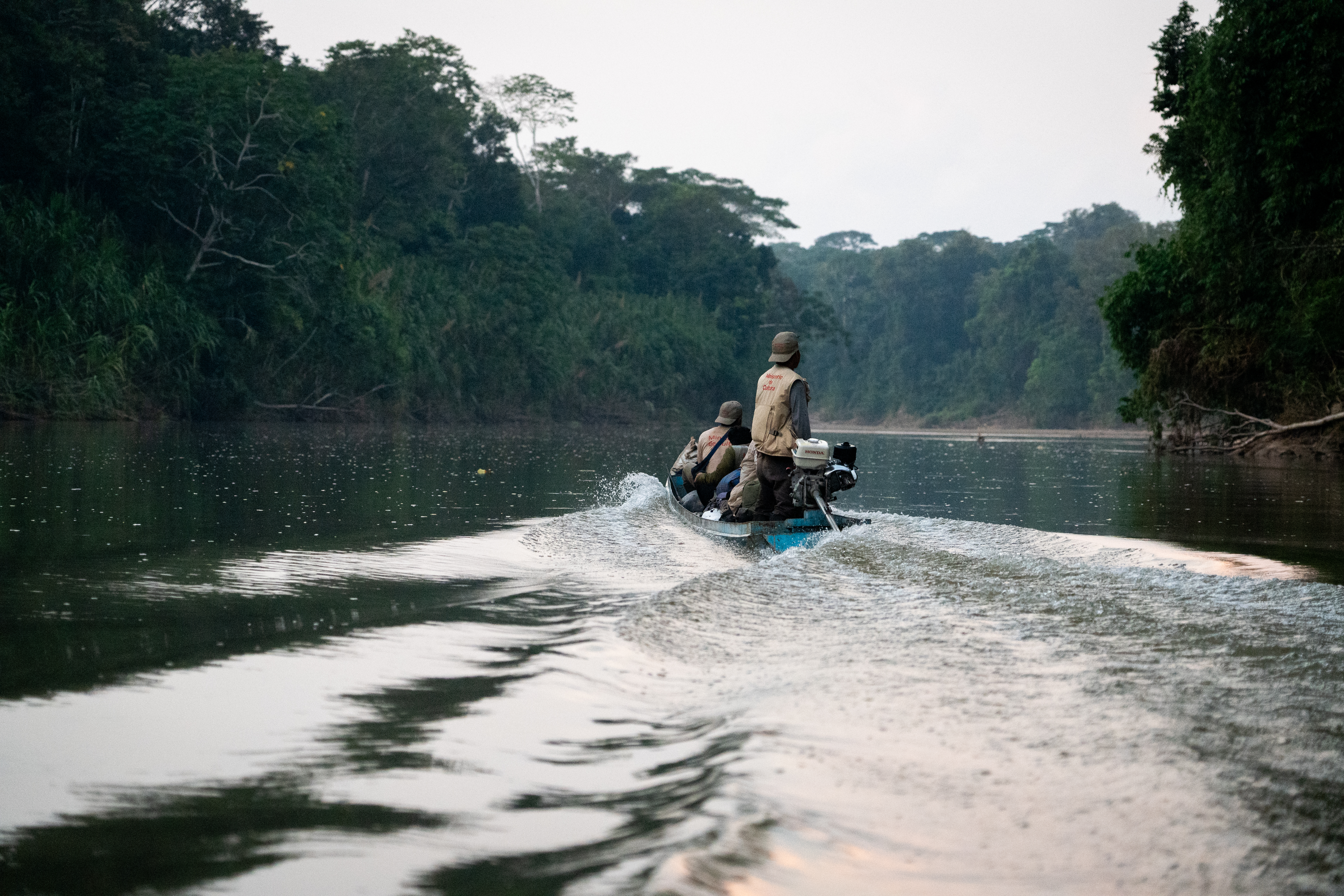 Huni Kuin protection agents Fredy Capitan and Nolasco Torres monitor a remote river for signs of isolated tribes in Peru’s Amazon [Neil Giardino/Al Jazeera]