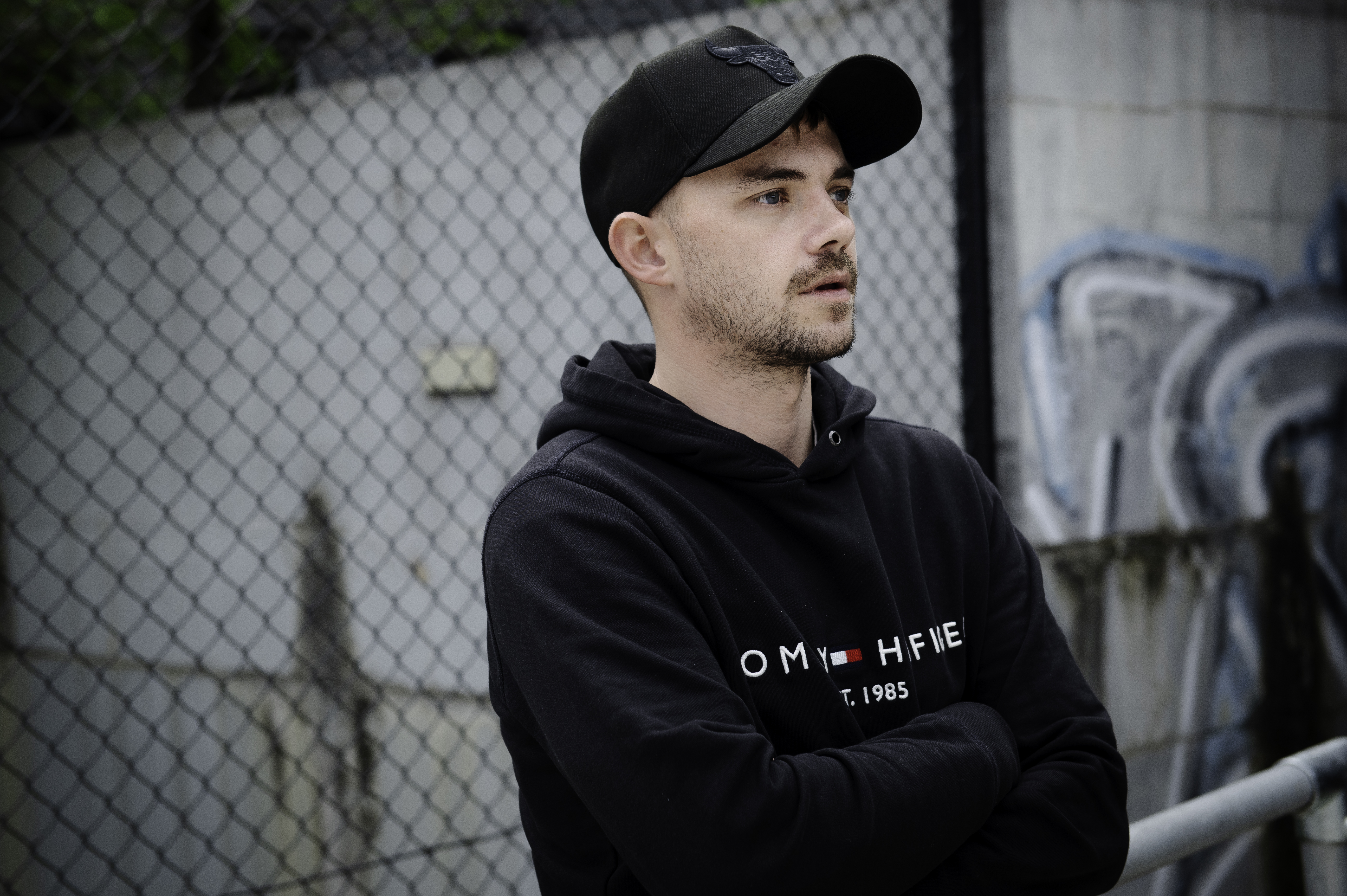 Charlie Samson. He's a young man wearing a black sweatshirt and baseball cap