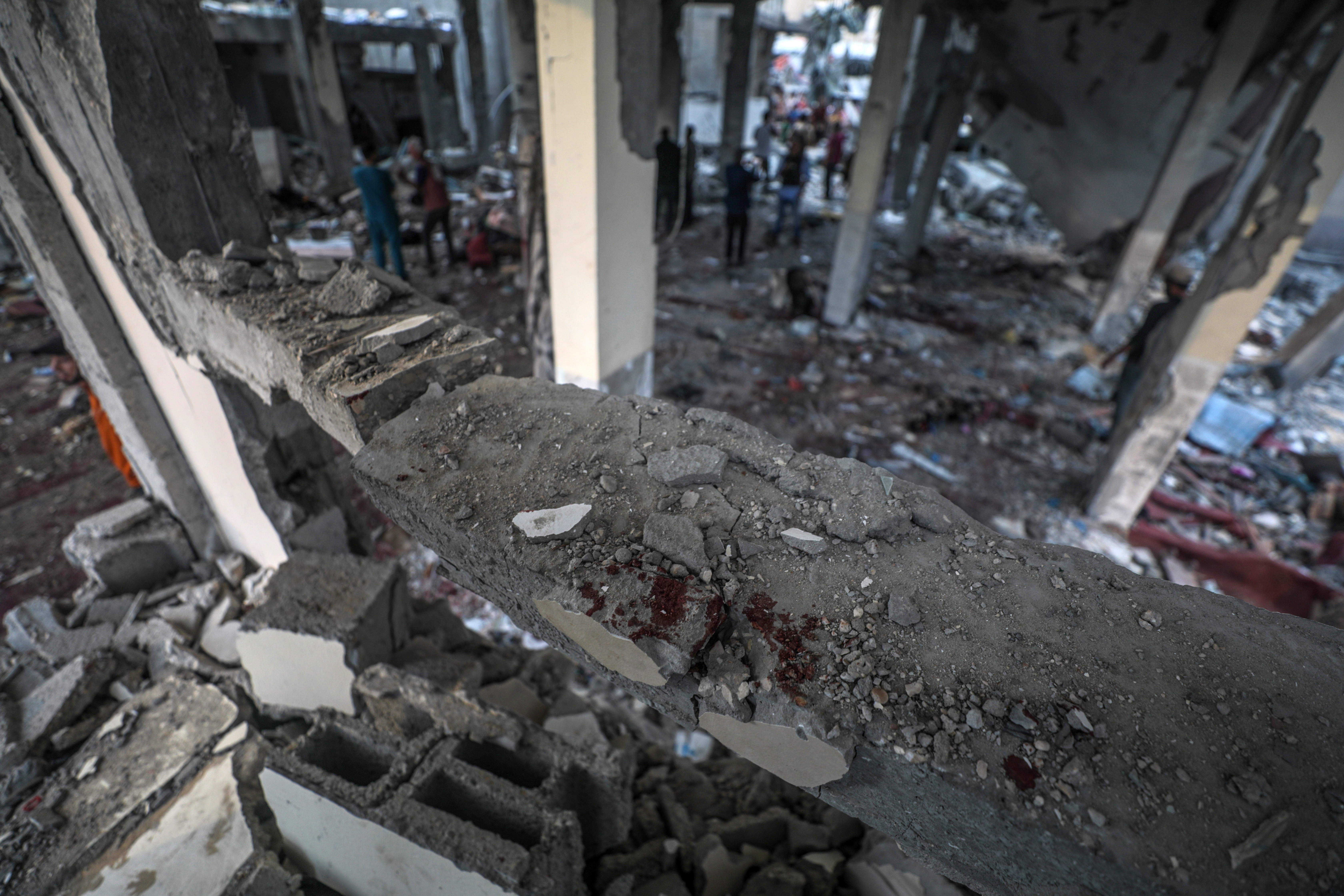 the destroyed Al Aqsa Martyrs Mosque