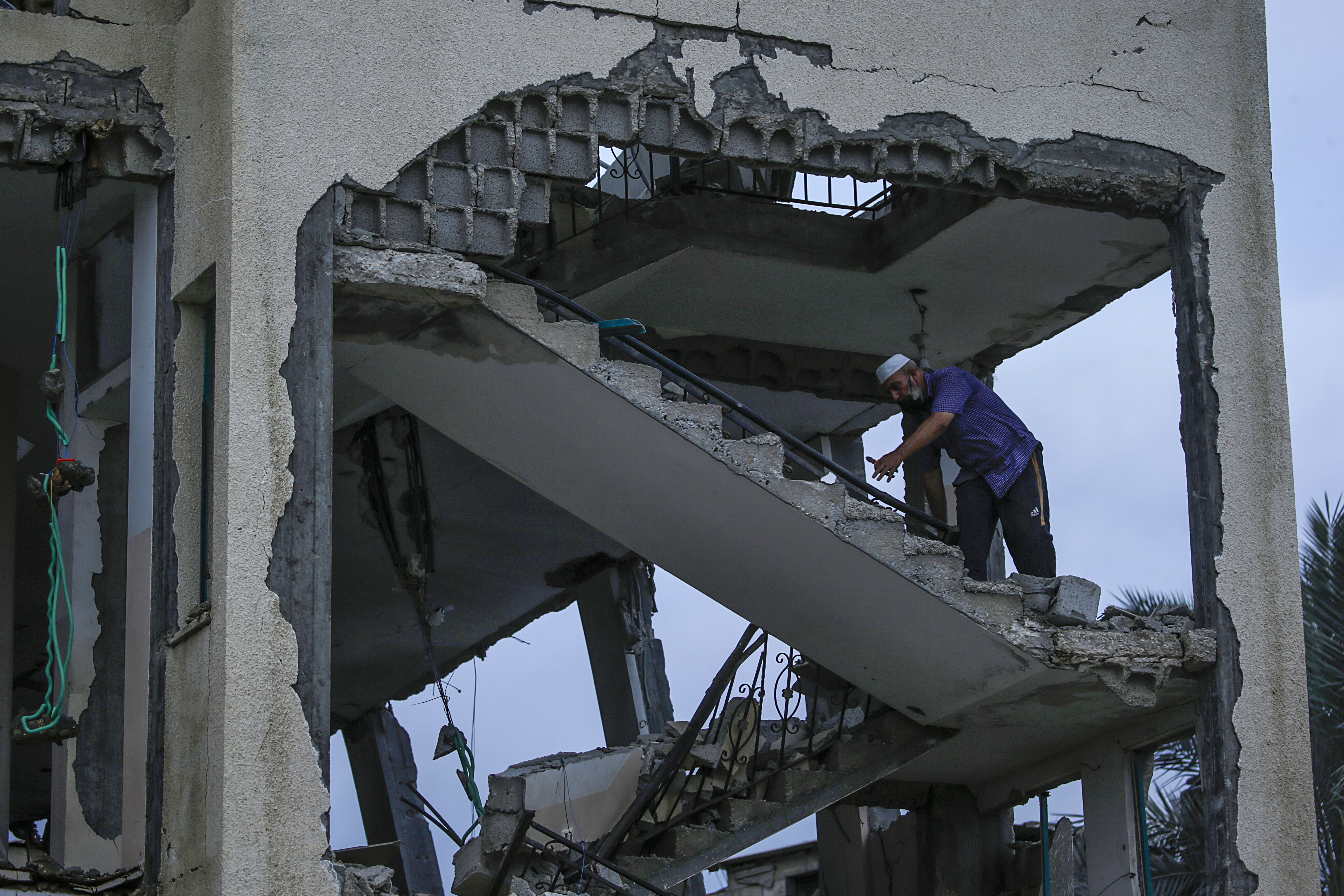the destroyed Al Aqsa Martyrs Mosque
