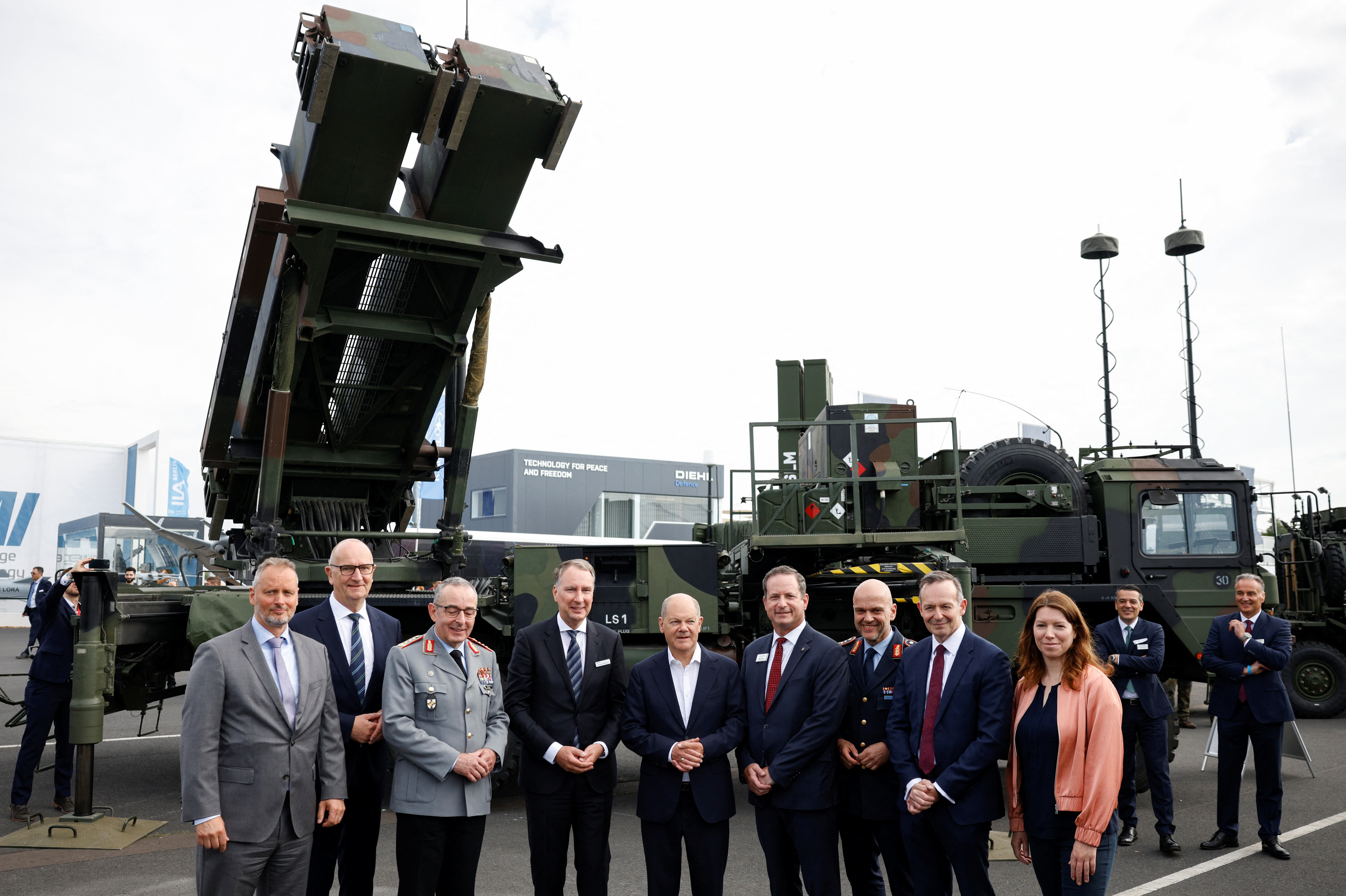 German Chancellor Olaf Scholz poses for a photo as he tours the International Aerospace Exhibition ILA on the opening day at Schoenefeld Airport in Berlin, Germany June 5, 2024. REUTERS/Axel Schmidt