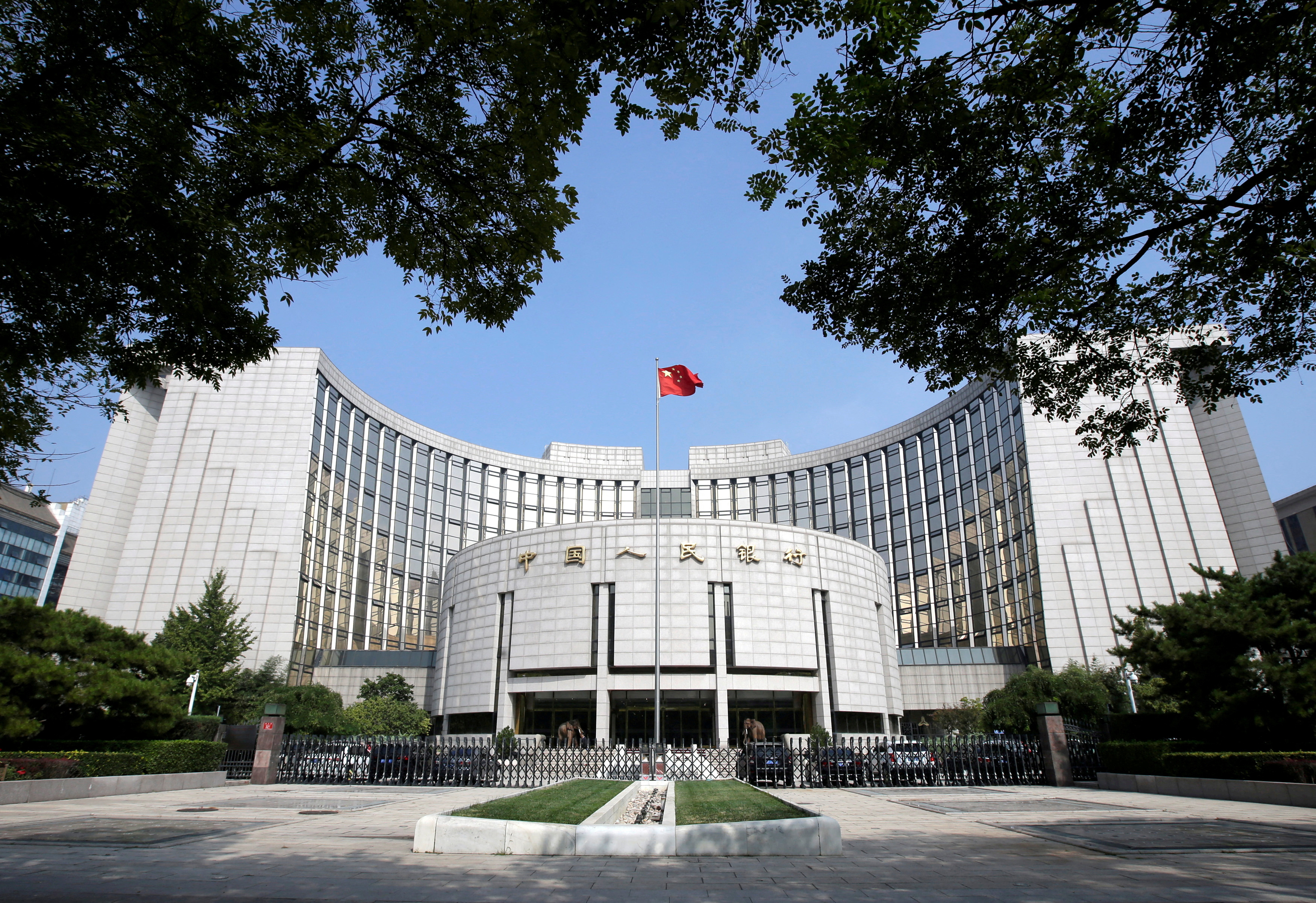 FILE PHOTO: FILE PHOTO: Headquarters of the People's Bank of China (PBOC), the central bank, is pictured in Beijing, China September 28, 2018. REUTERS/Jason Lee/File Photo/File Photo