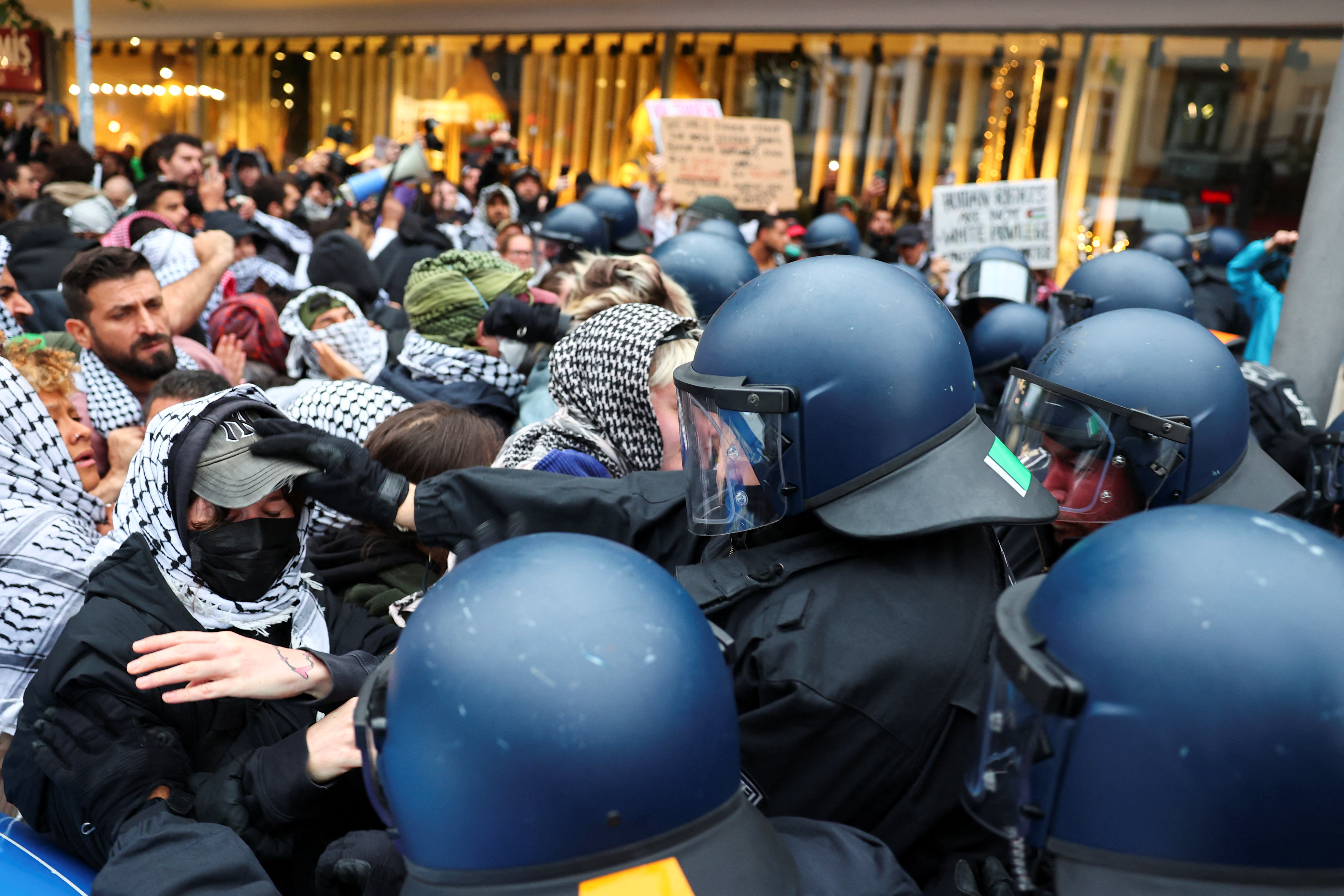 Police officers clash with protesters during a demonstration in support of Palestinians in Gaza, one day ahead of the anniversary of Hamas' October 7 attack on Israel, in Berlin, Germany, October 6