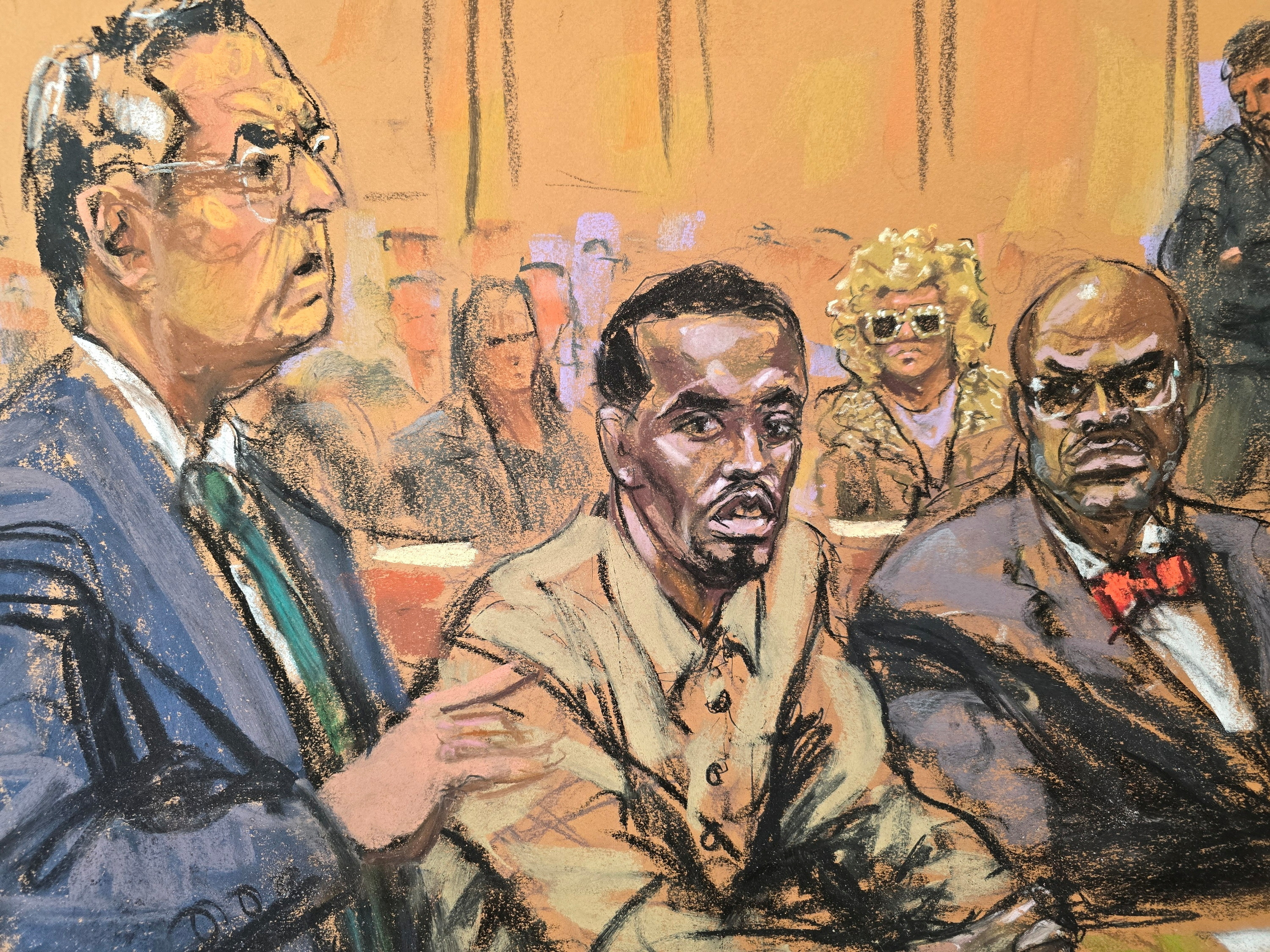 A courtroom sketch of Combs with his lawyers