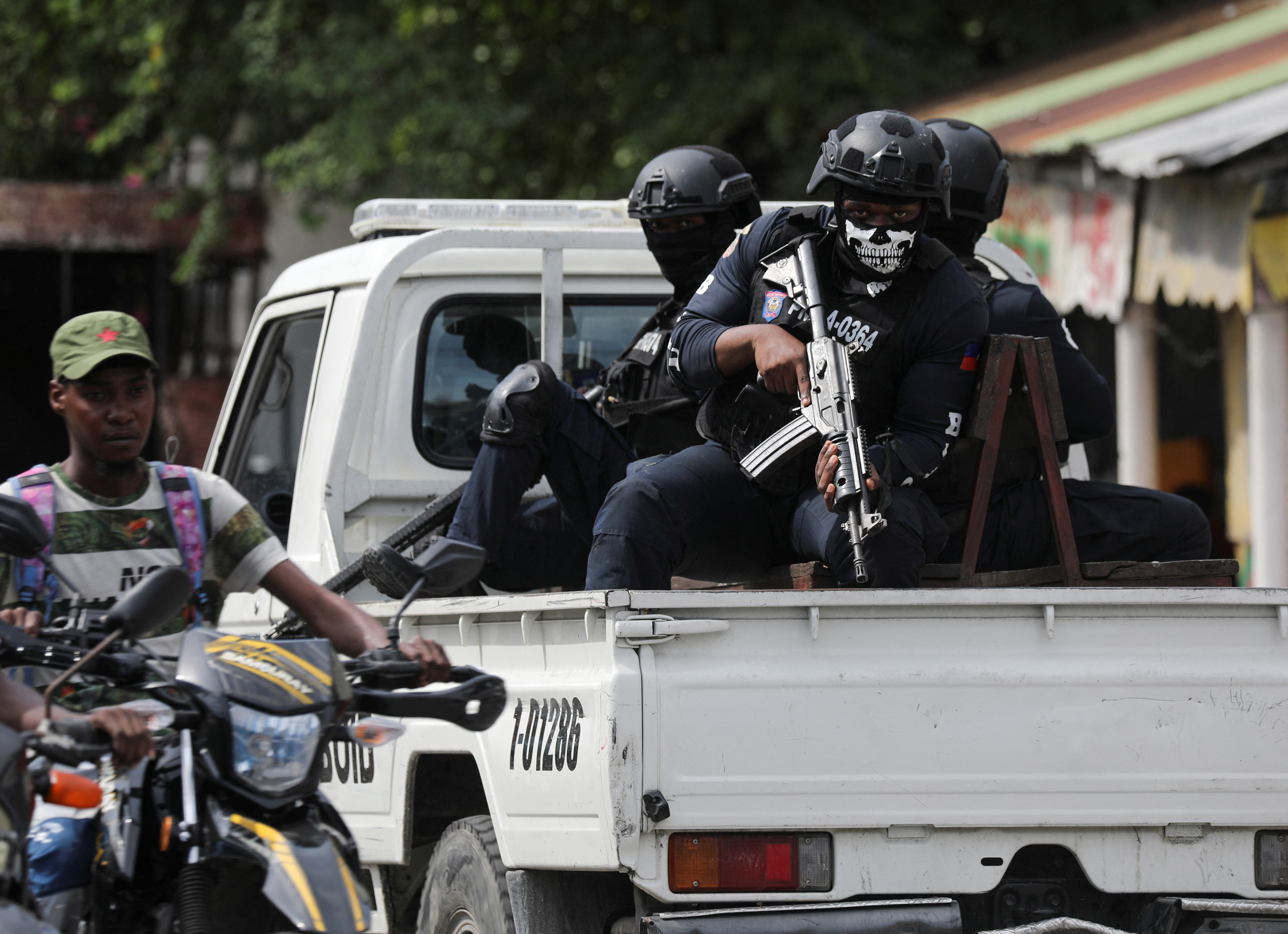 Police patrol the area due to gang activity that has forced residents to flee their homes, in Port-au-Prince, Haiti October 20, 2024. REUTERS/Ralph Tedy Erol