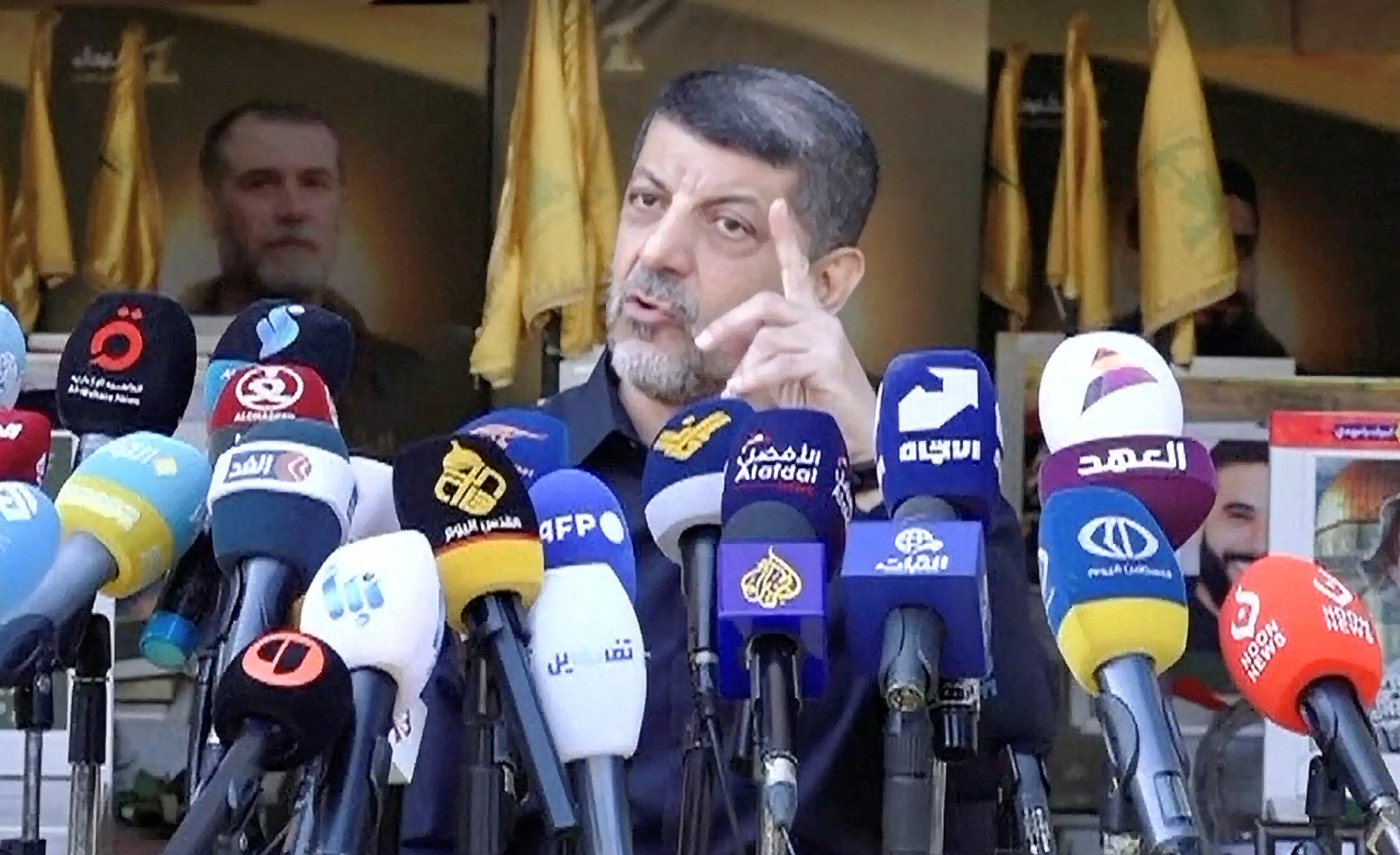 The head of Hezbollah's media office, Mohammad Afif, gestures as he speaks during a press conference, in Ghobeiry, Lebanon October 22, 2024, in this still image from a video. Al Manar TV/Reuters TV via REUTERS THIS IMAGE HAS BEEN SUPPLIED BY A THIRD PARTY.