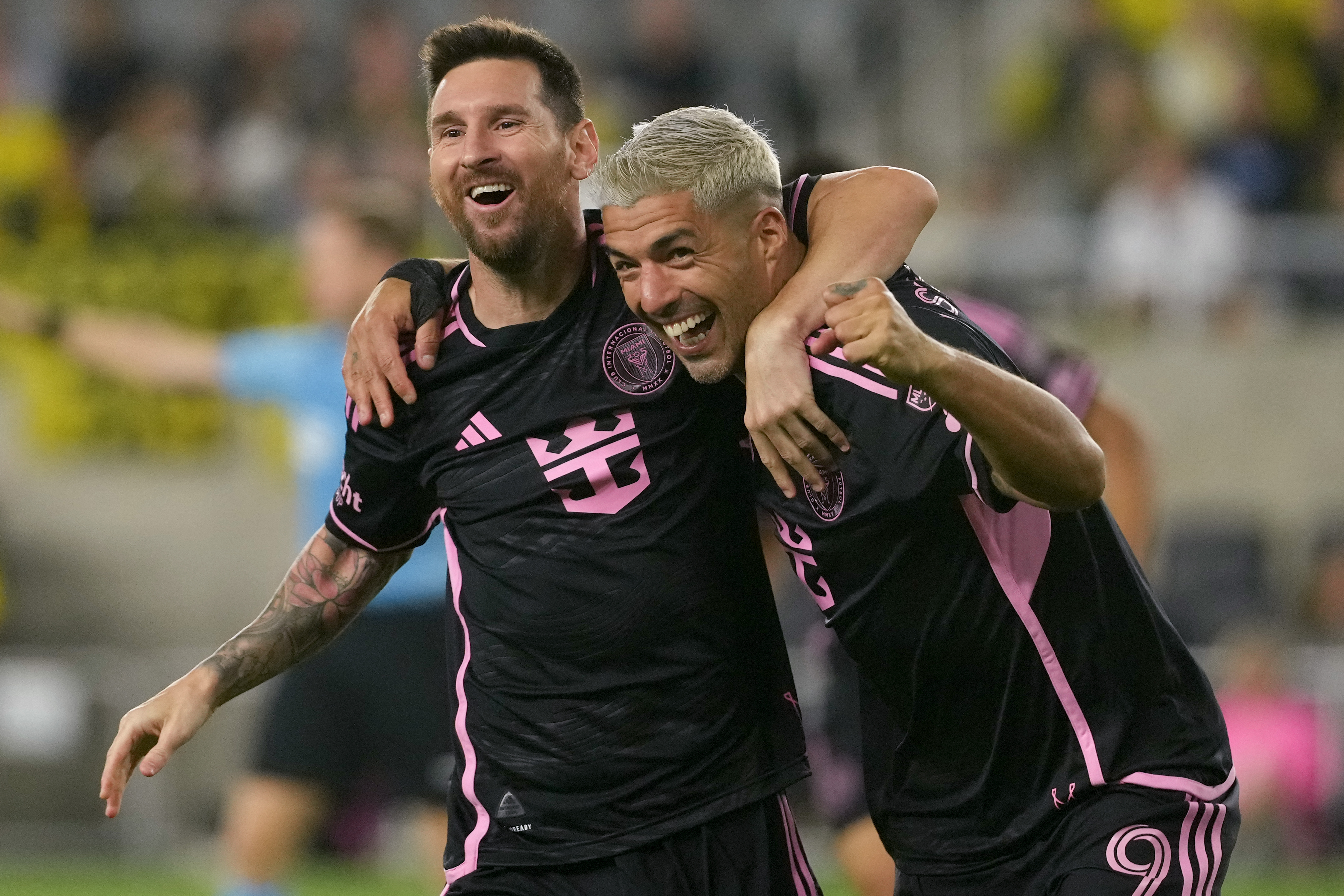 COLUMBUS, OHIO - OCTOBER 02: Lionel Messi #10 and Luis Suarez #9 of Inter Miami CF celebrate a goal during the second half against the Columbus Crew at Lower.com Field on October 02, 2024 in Columbus, Ohio. Jason Mowry/Getty Images/AFP (Photo by Jason Mowry / GETTY IMAGES NORTH AMERICA / Getty Images via AFP)