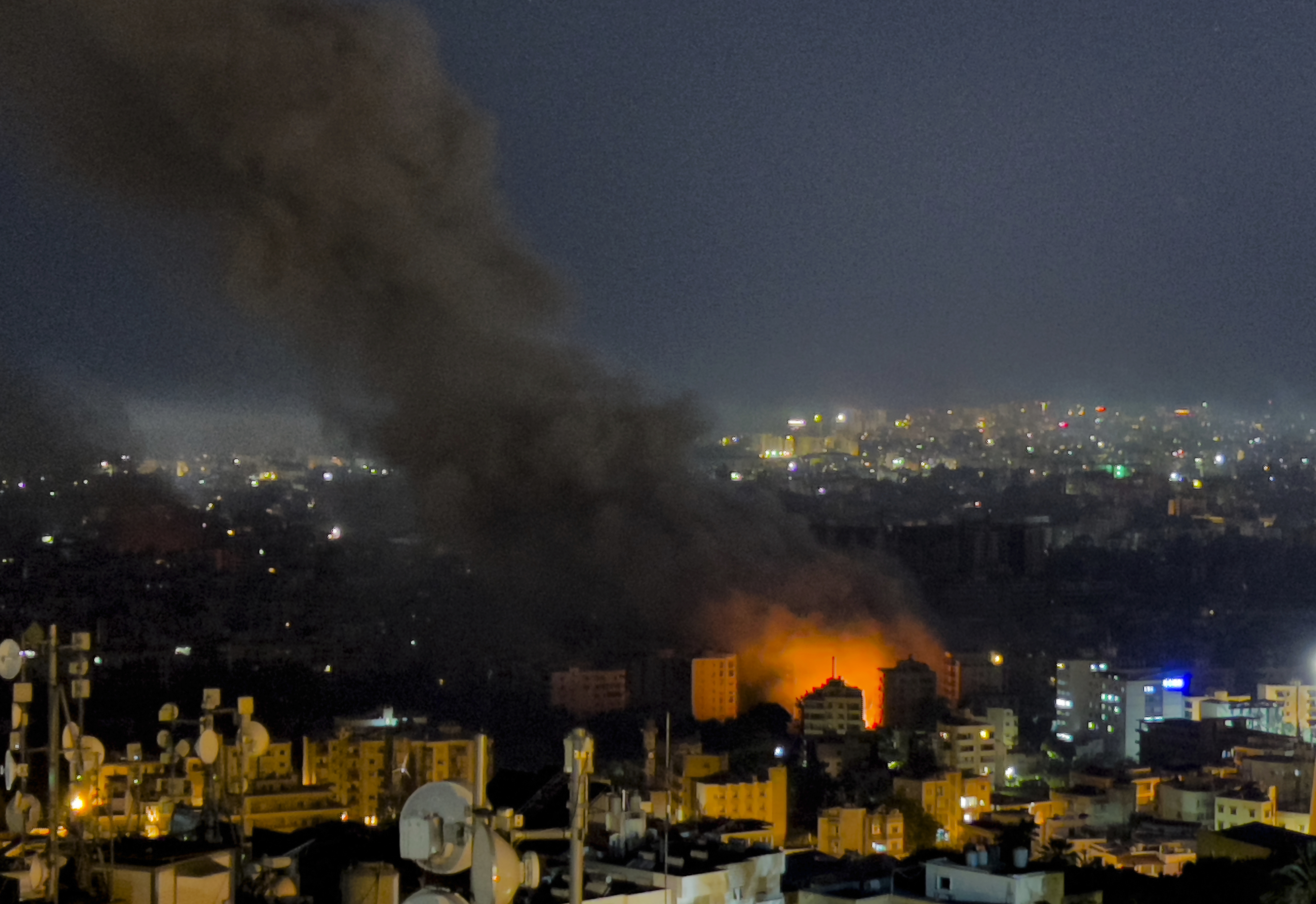 Flames and smoke rise from Israeli airstrikes in Dahiyeh, Beirut, Lebanon, Friday